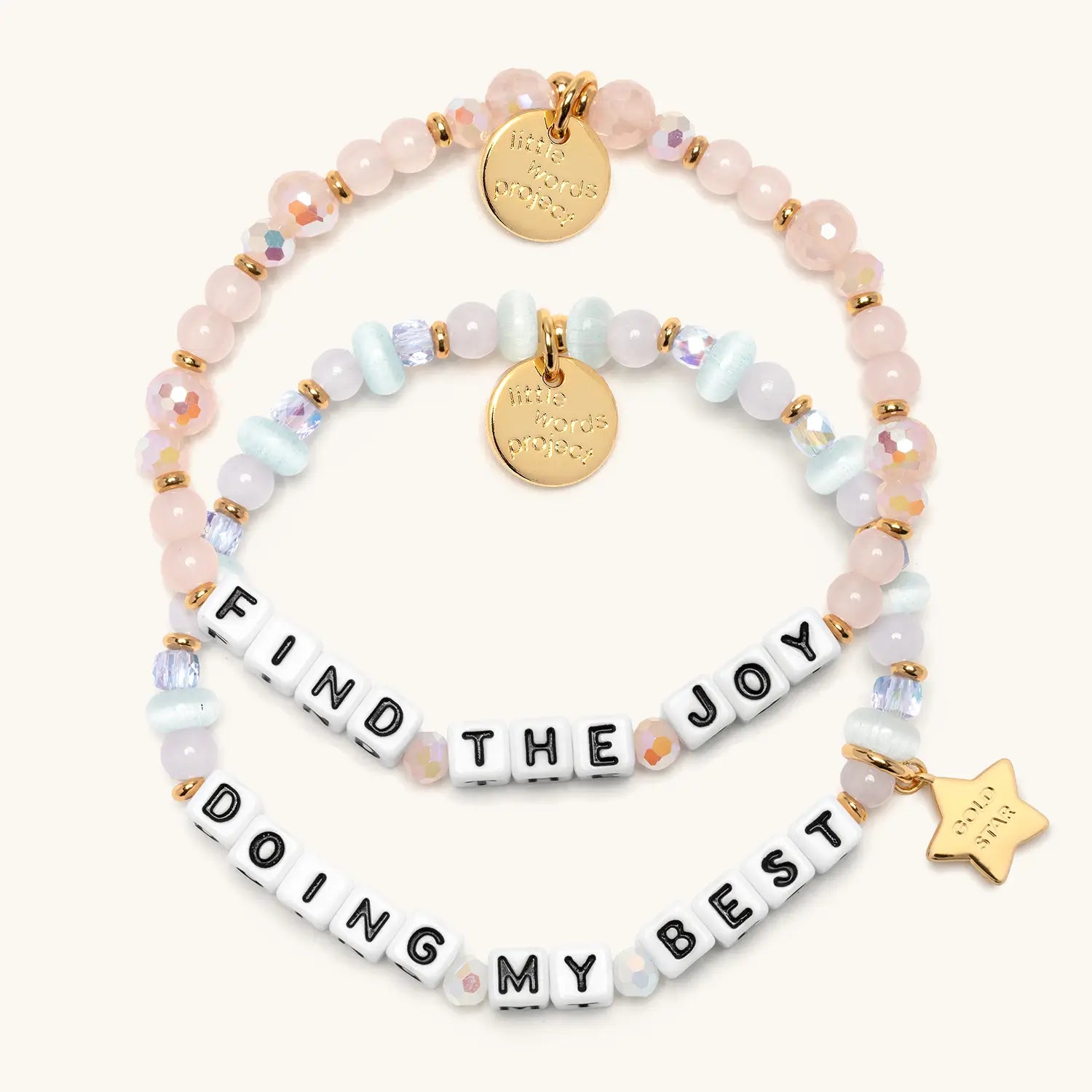 Daydreamer Bracelet Set with Find The Joy and Doing My Best pastel beaded bracelets, flat lay