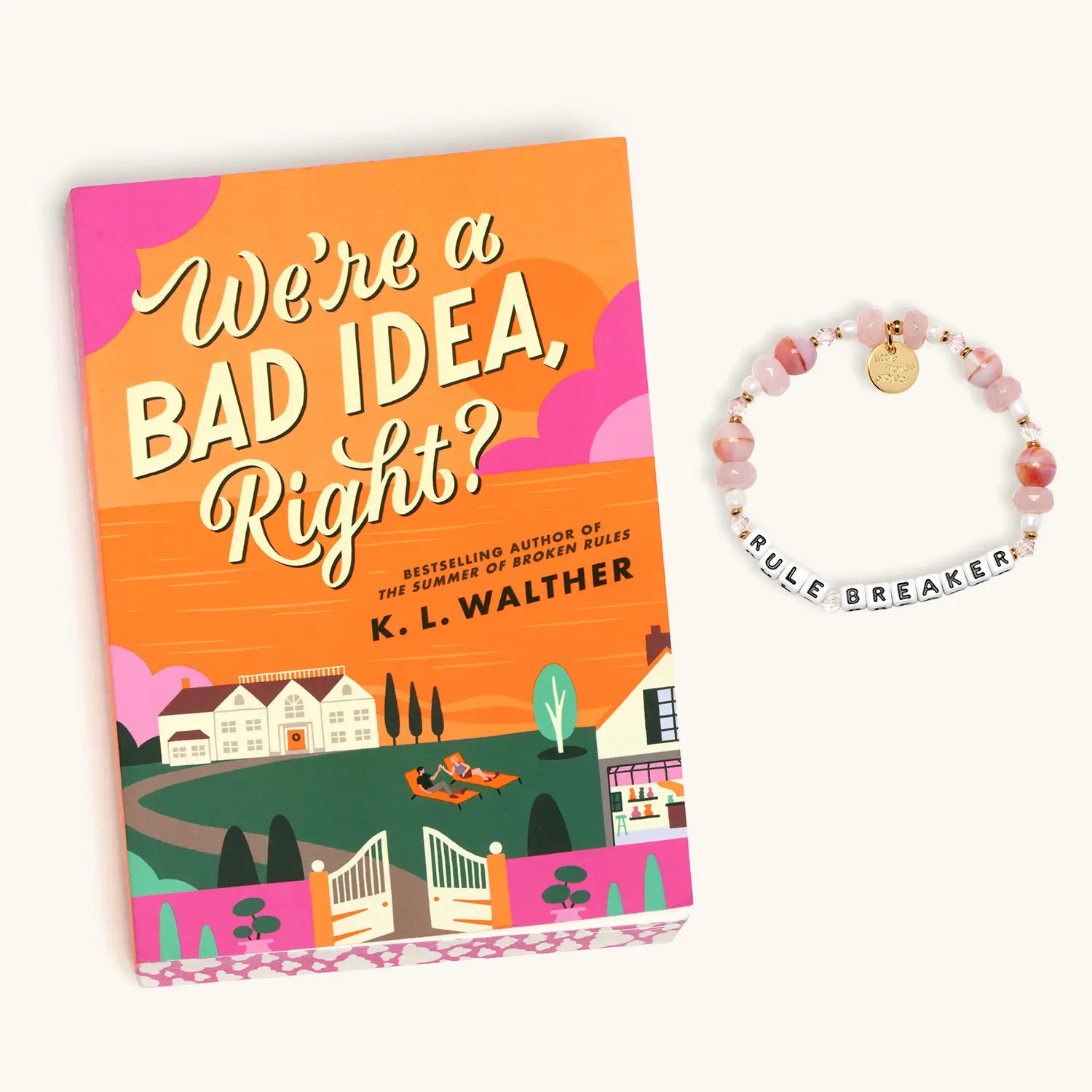 Book titled 'We're a Bad Idea, Right?' by K.L. Walther with a bracelet on a white background