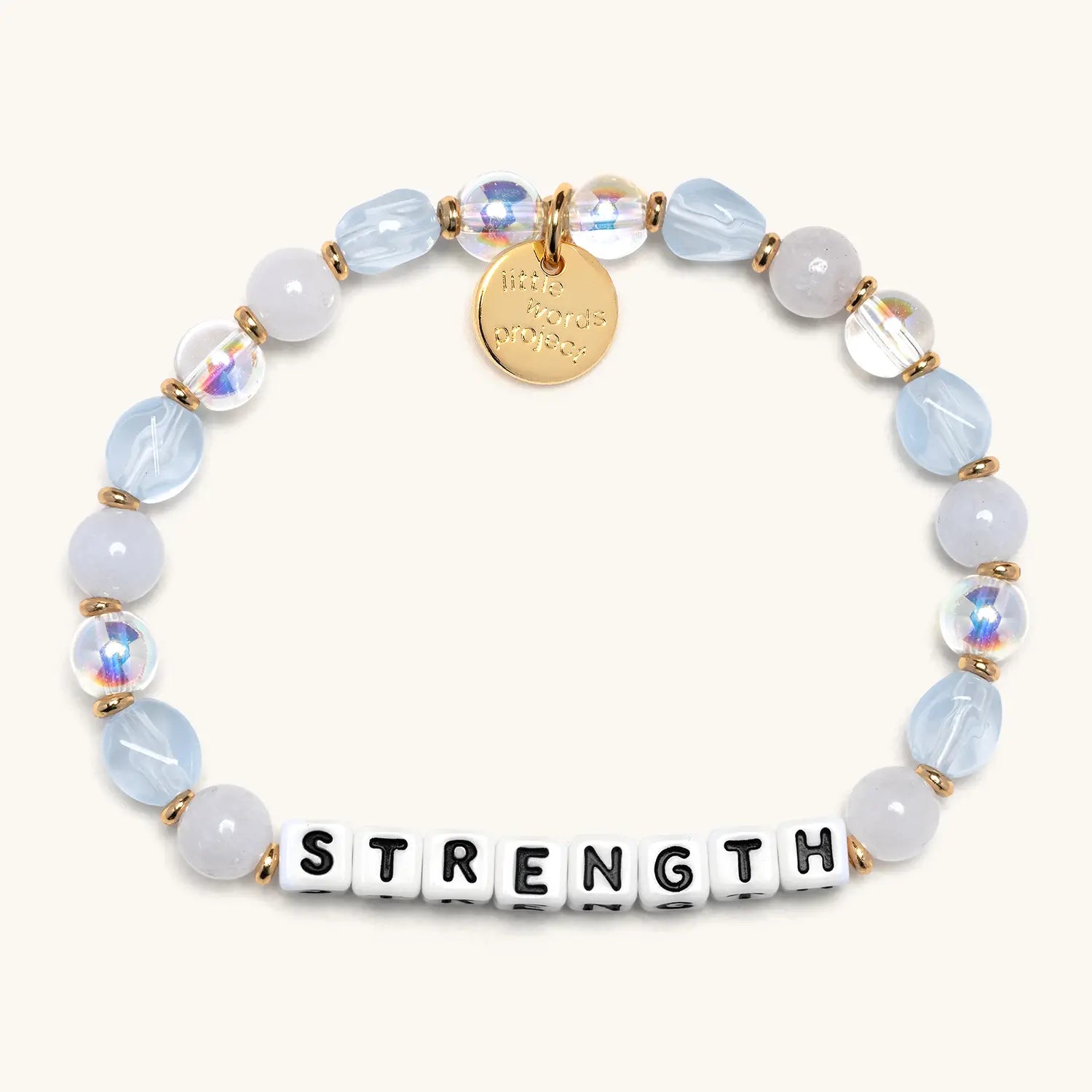 Bracelet with beads and letter tiles spelling 'STRENGTH' on a white background