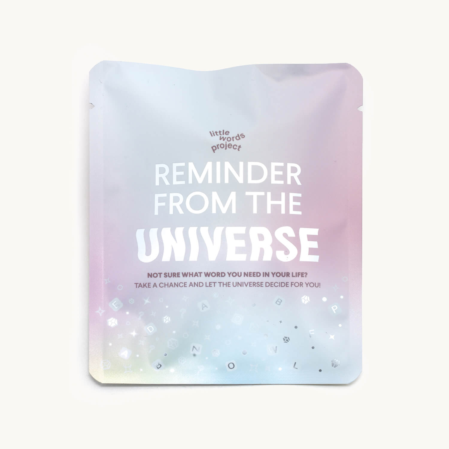 Product packaging with 'Reminder from the Universe' text on a gradient background