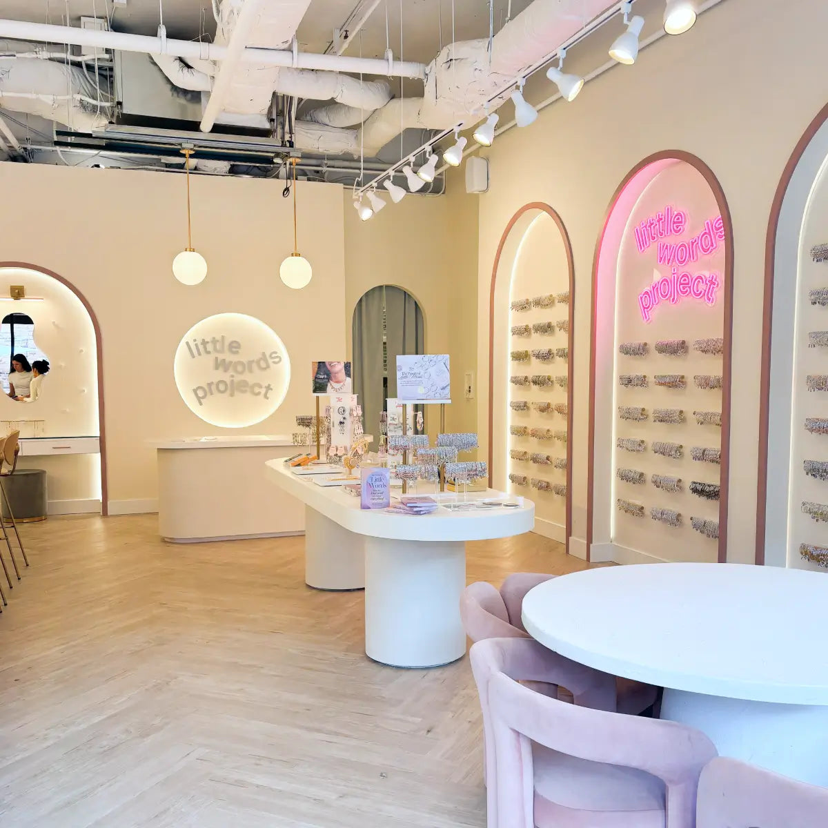 Modern interior design of a store with 'little words project' branding.