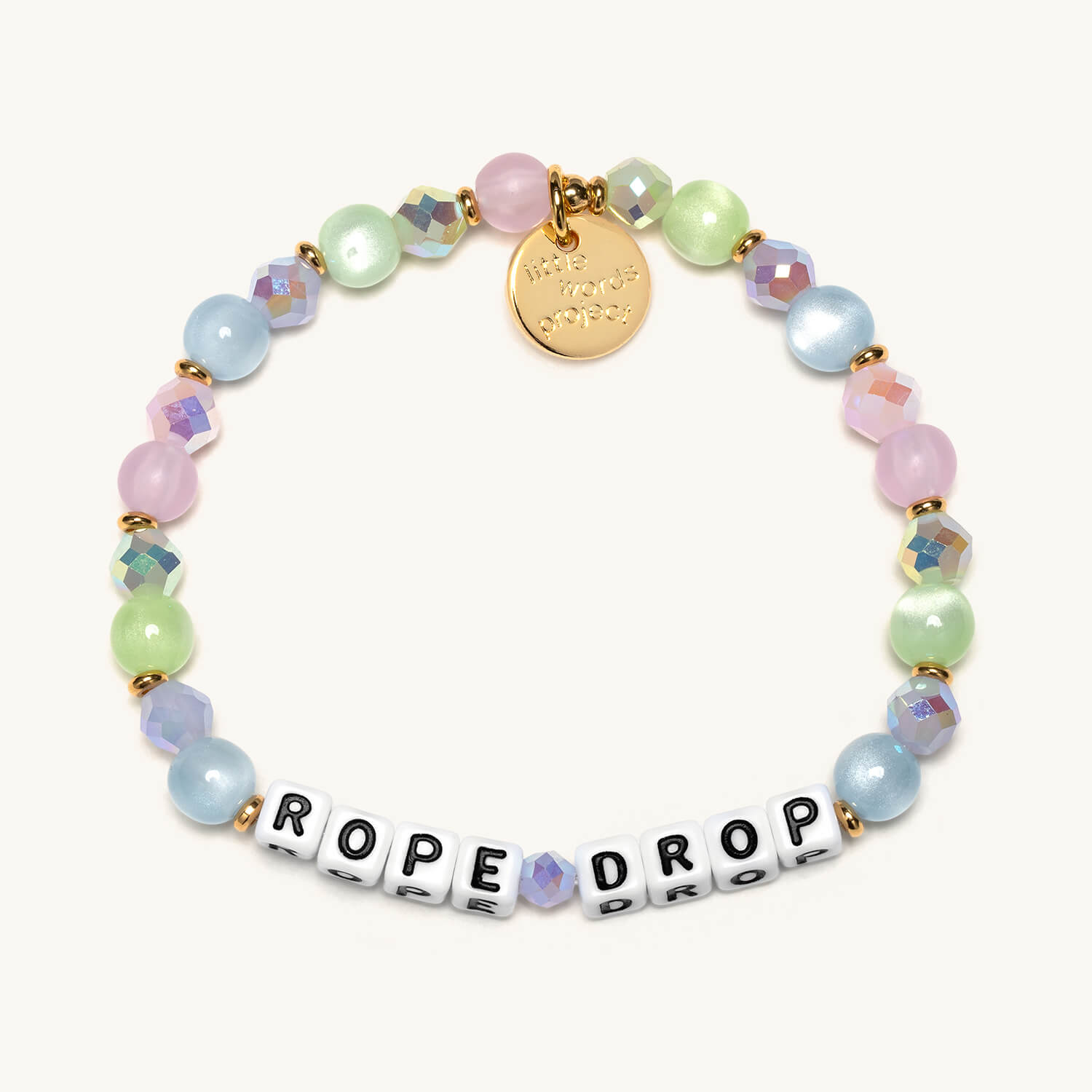 Colorful beaded bracelet with a gold tag and 'ROPE DROP' letter beads on a white background