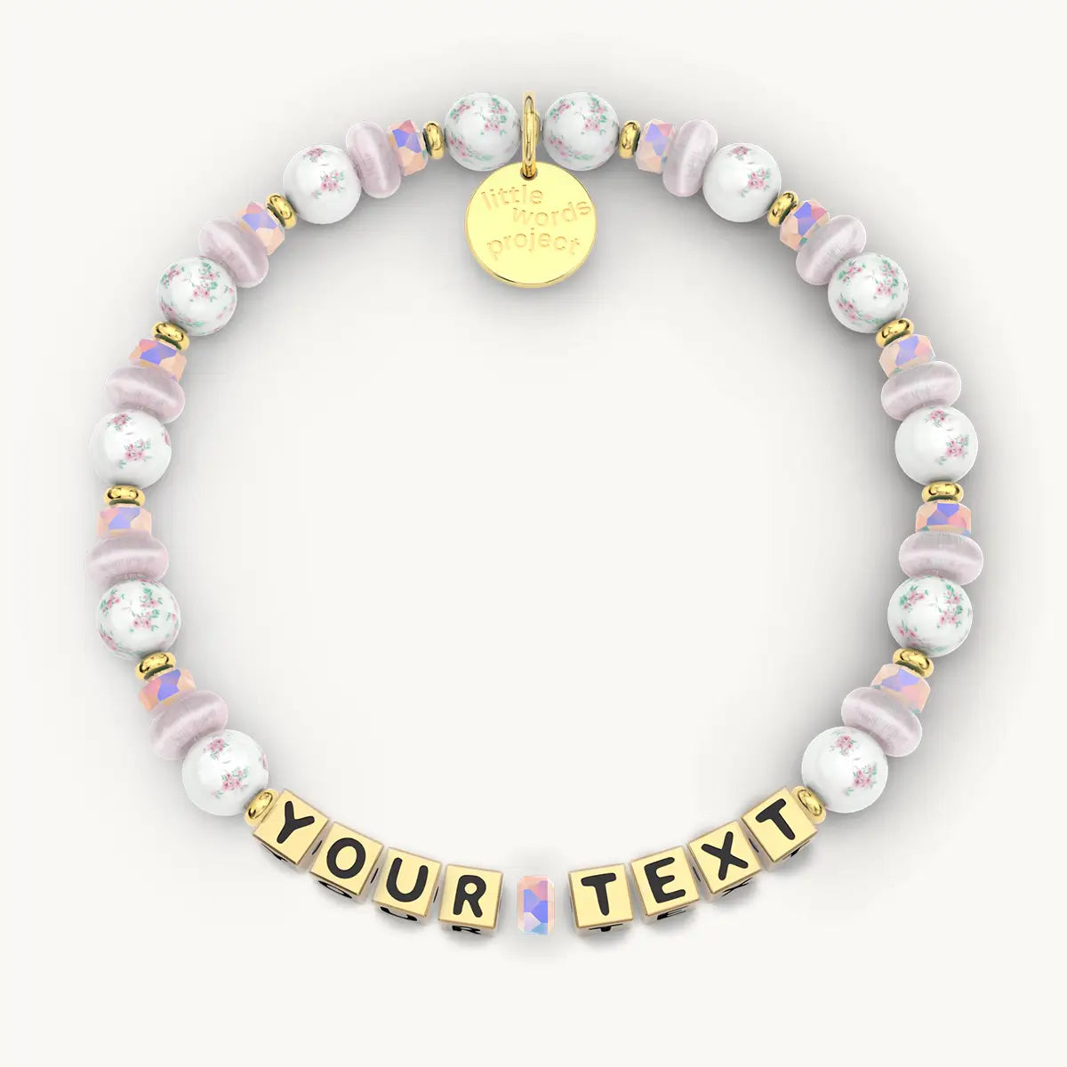 Personalized beaded bracelet with 'Your Text' charm on a white background