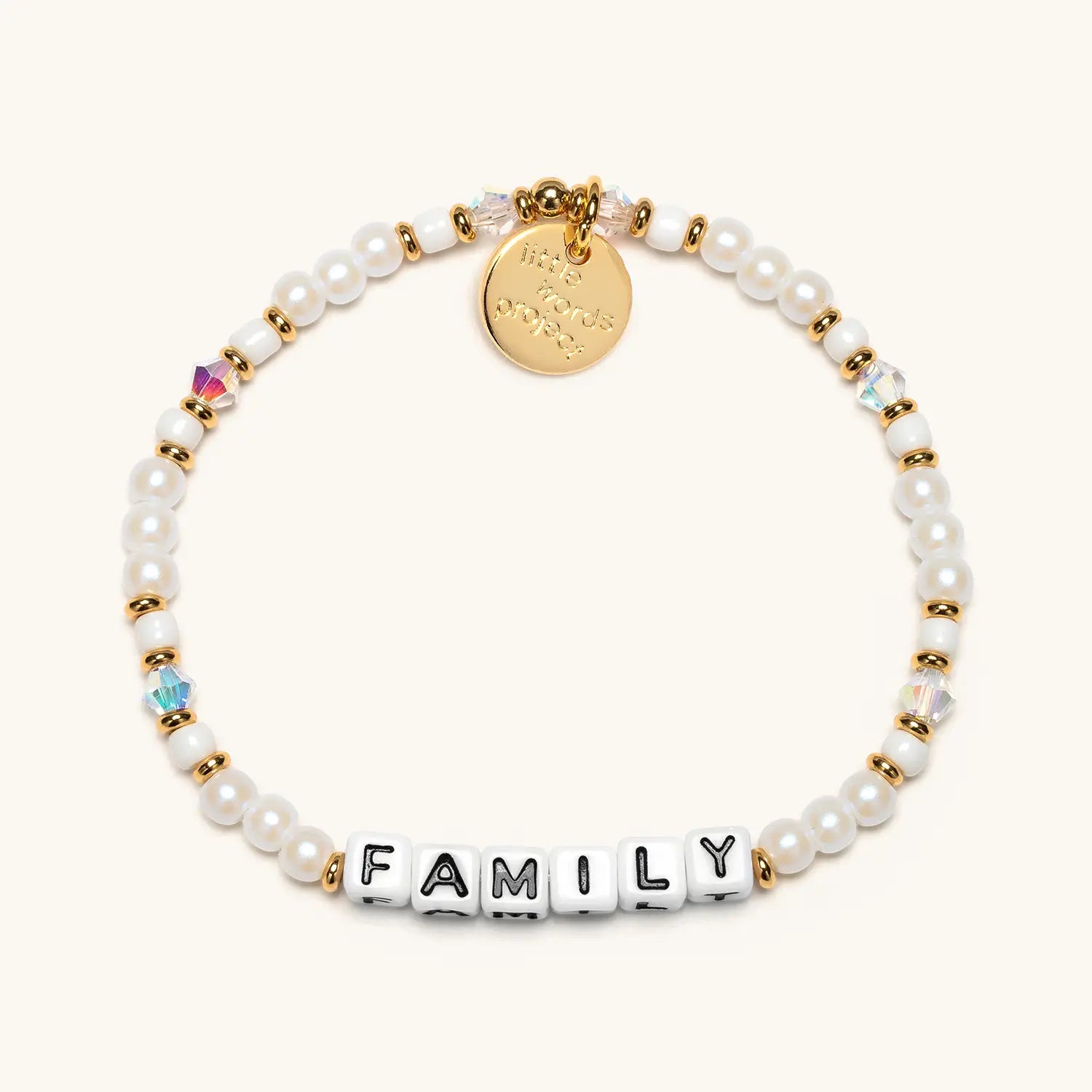 Bracelet with pearls, gold accents, and 'FAMILY' on a white background