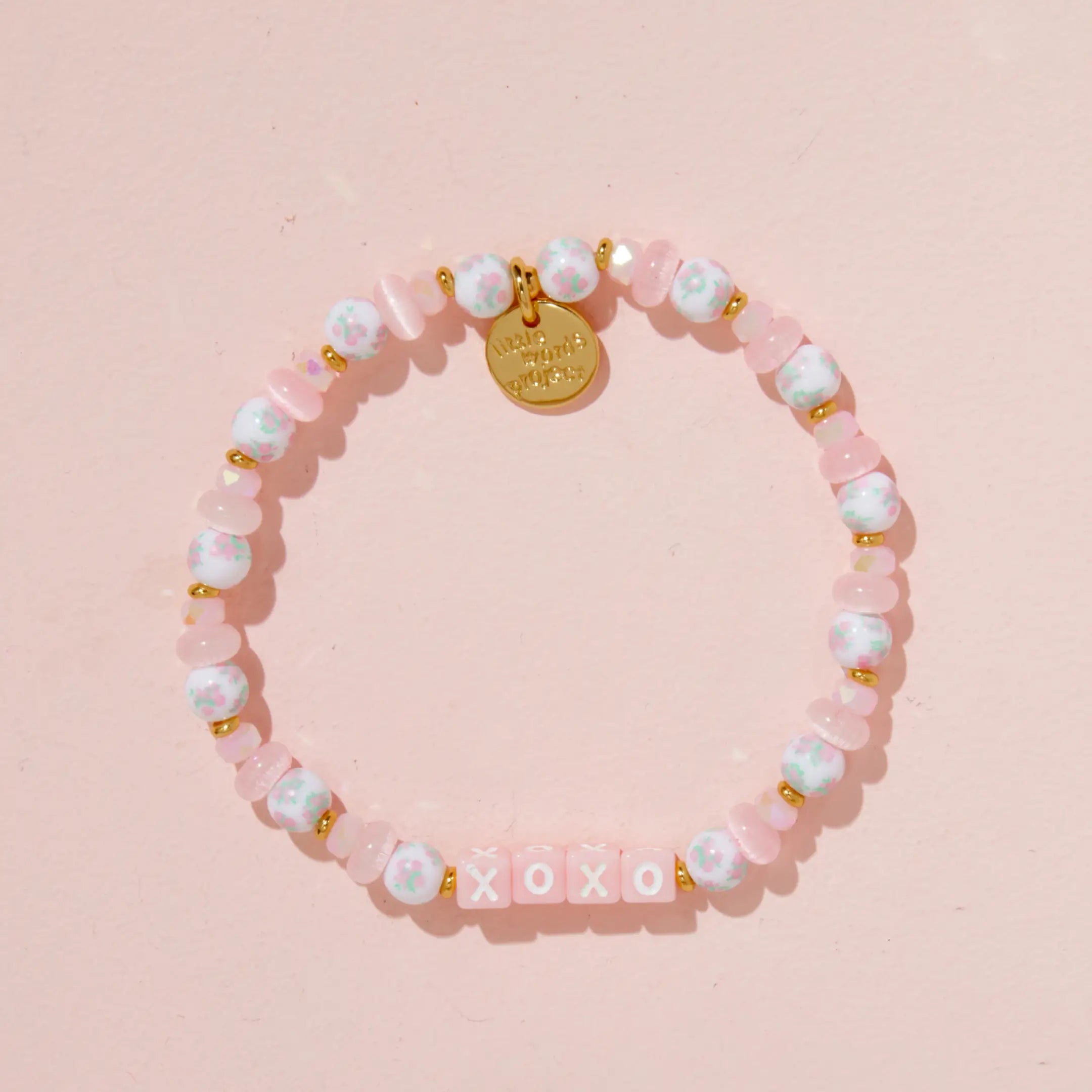 Floral Custom Bracelet with Pink Letters spelling XOXO