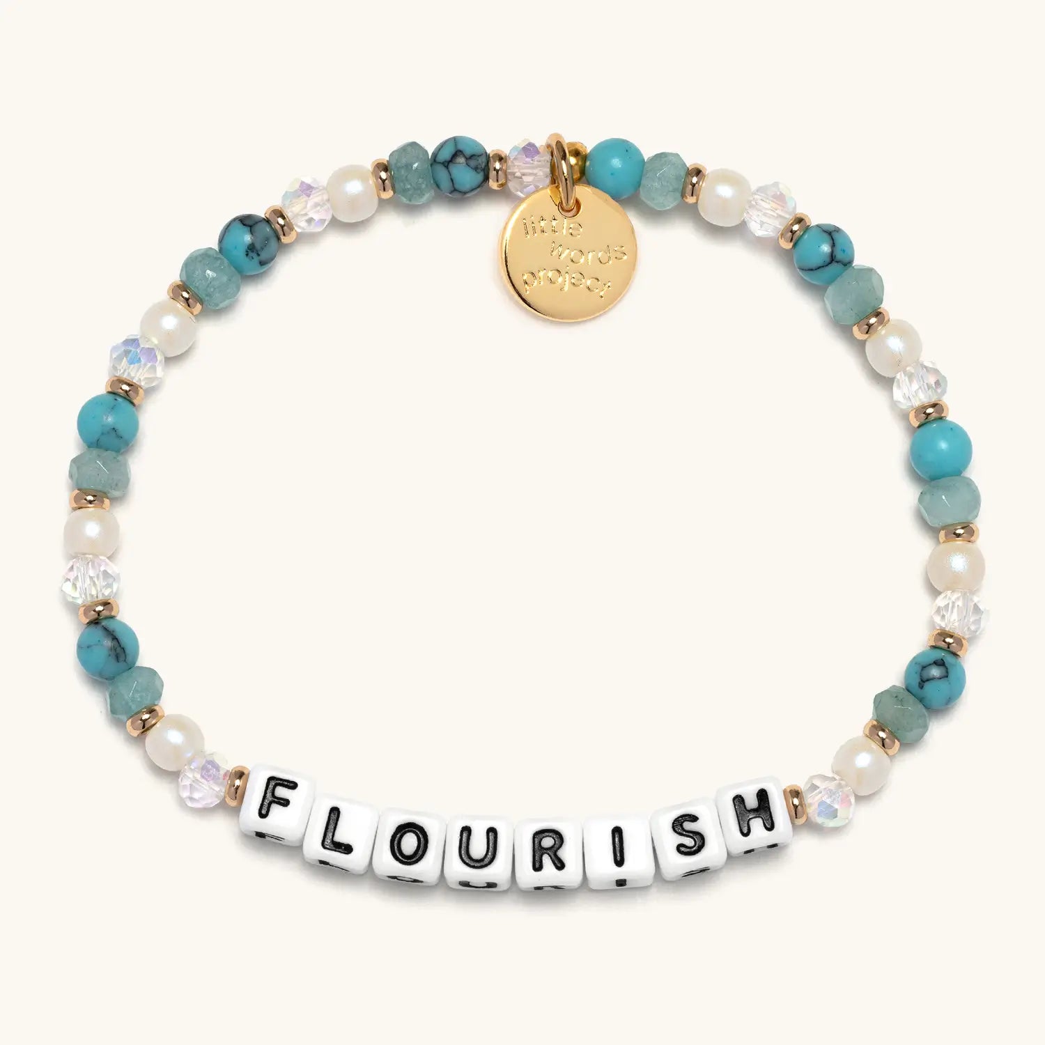 Bracelet with turquoise and white beads and a gold charm on a white background