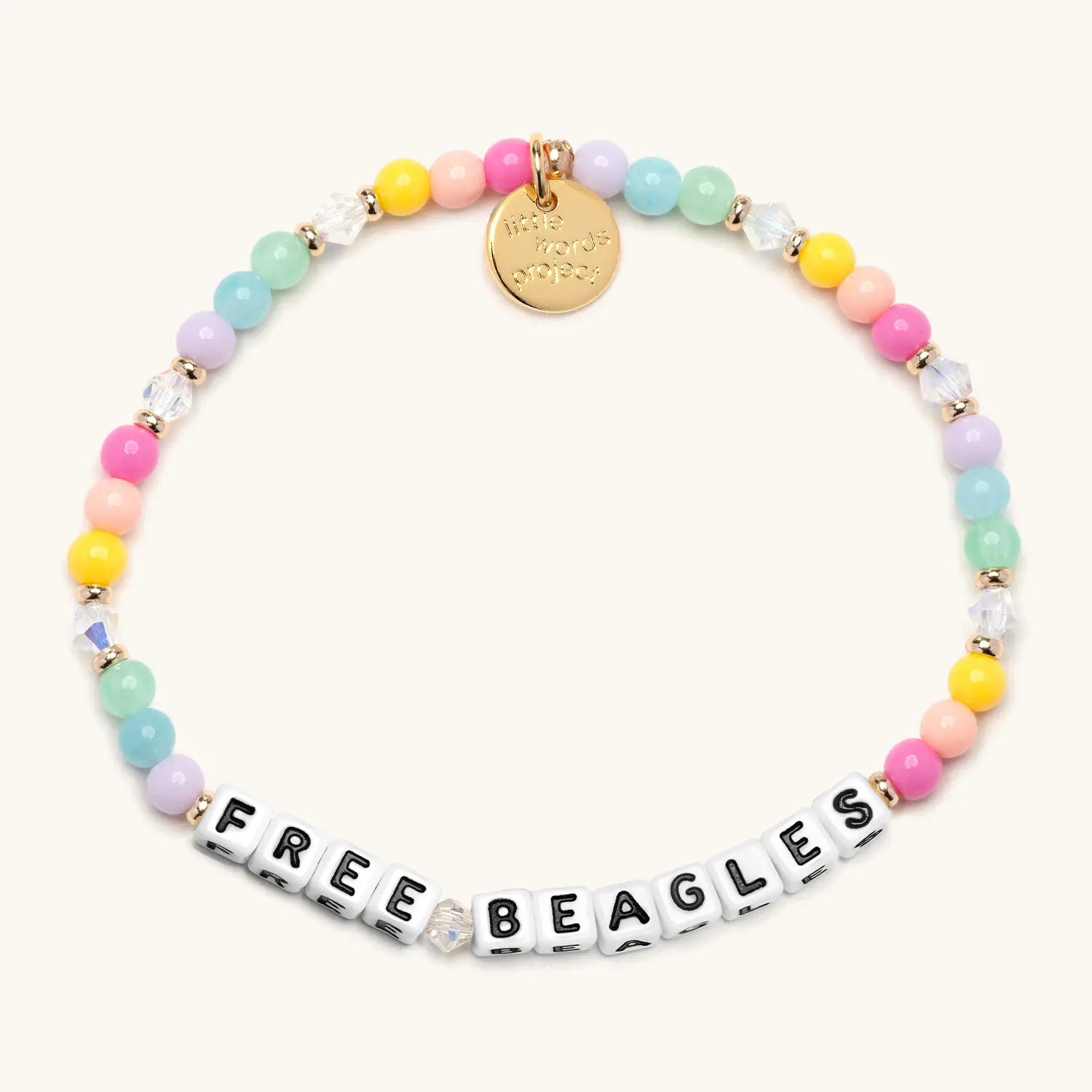 Colorful beaded bracelet with a gold tag and 'FREE BEAGLES' message on a white background