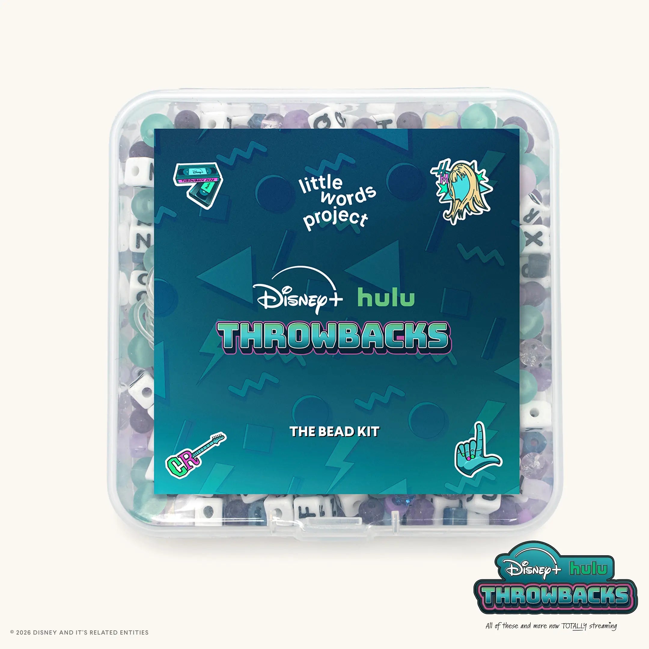 Y2K Bead Kit from Disney+ Hulu Throwbacks in a clear snap case filled with teal, purple, gray, and clear beads and white letter blocks, shown front-on with the Disney+ hulu Throwbacks label