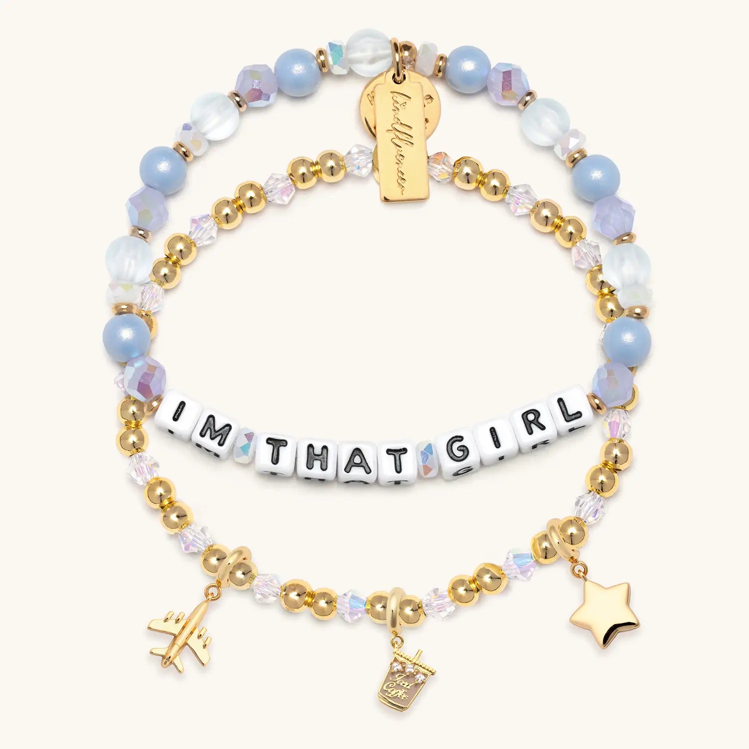 Bracelet with 'I'm That Girl' bracelet and a Charm bracelet on a white background