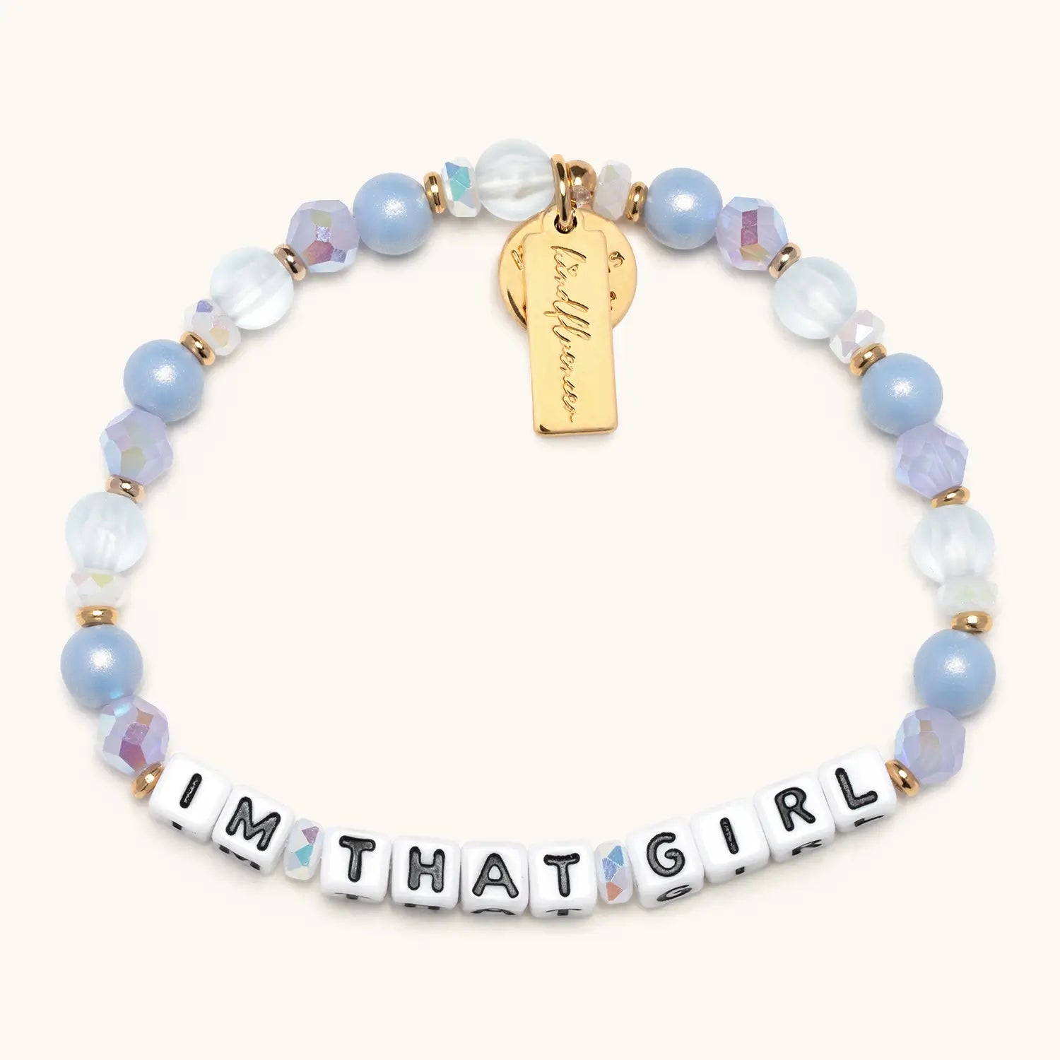 Bracelet with beads and a gold tag on a white background