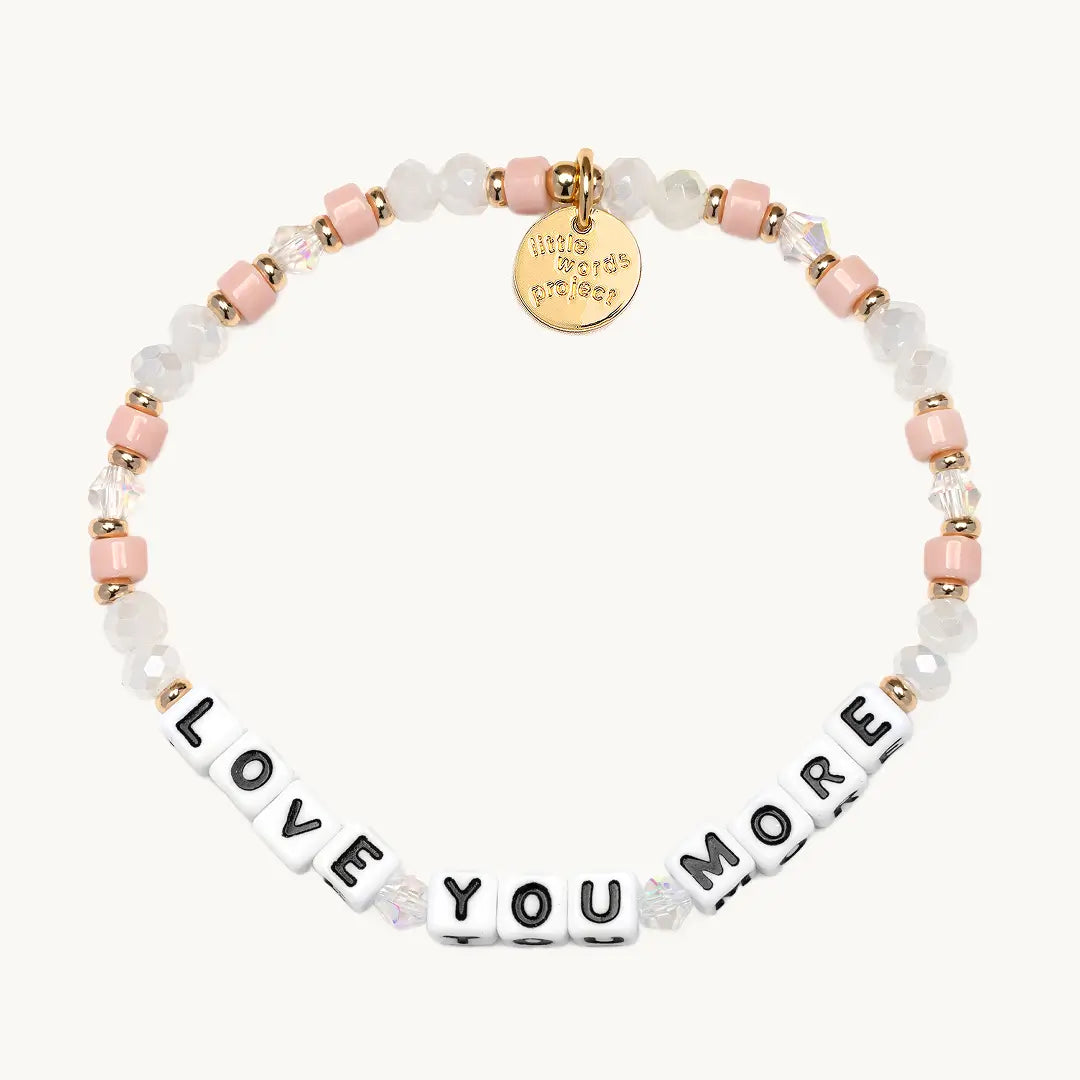 Bracelet with 'LOVE YOU MORE' beads on a white background