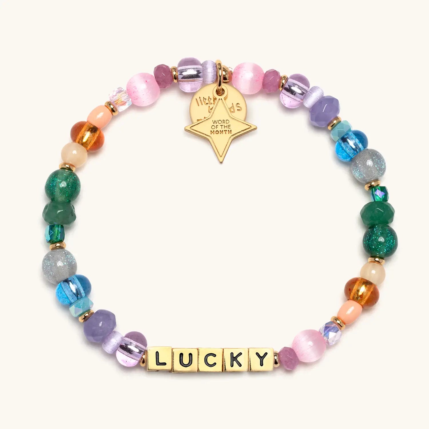 Lucky March Word of the Month bracelet with multicolored beads and gold letter beads on a white background