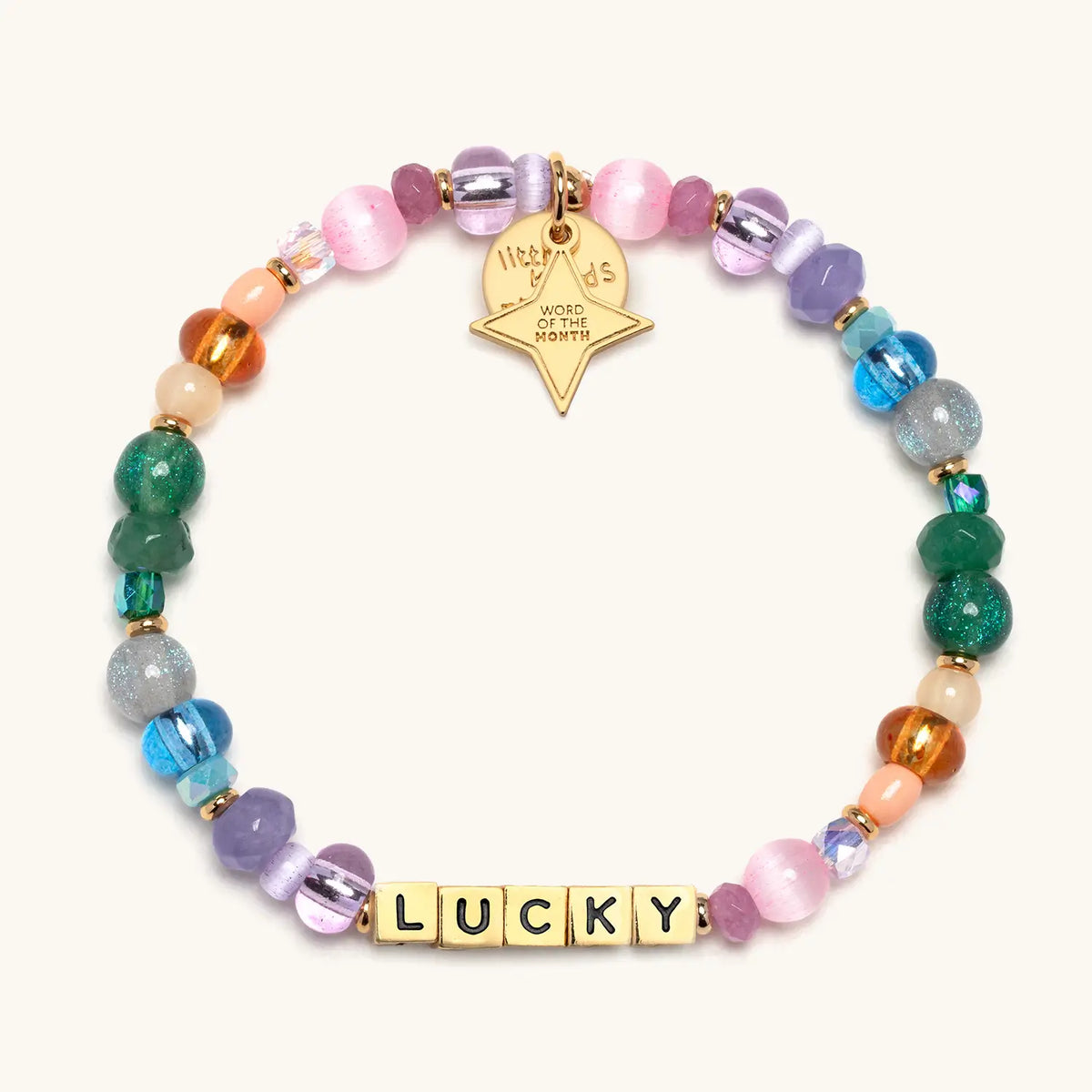 Lucky bracelet with multicolored beads and gold letter beads, from the Six Months of Intention set