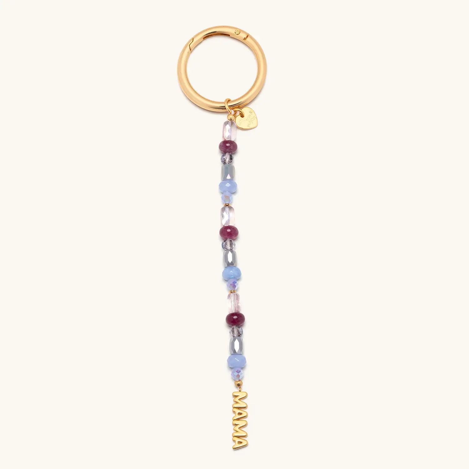 A beaded keychain charm featuring alternating deep burgundy round beads and light blue faceted beads on a strand, with a gold "MAMA" letter charm at the bottom and a small gold heart charm at the top, attached to a large gold spring-ring clasp.