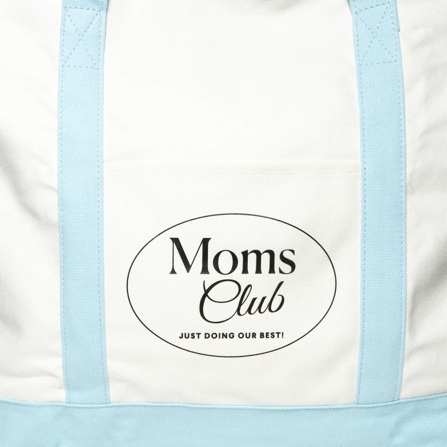 Light blue and white Moms Club bag