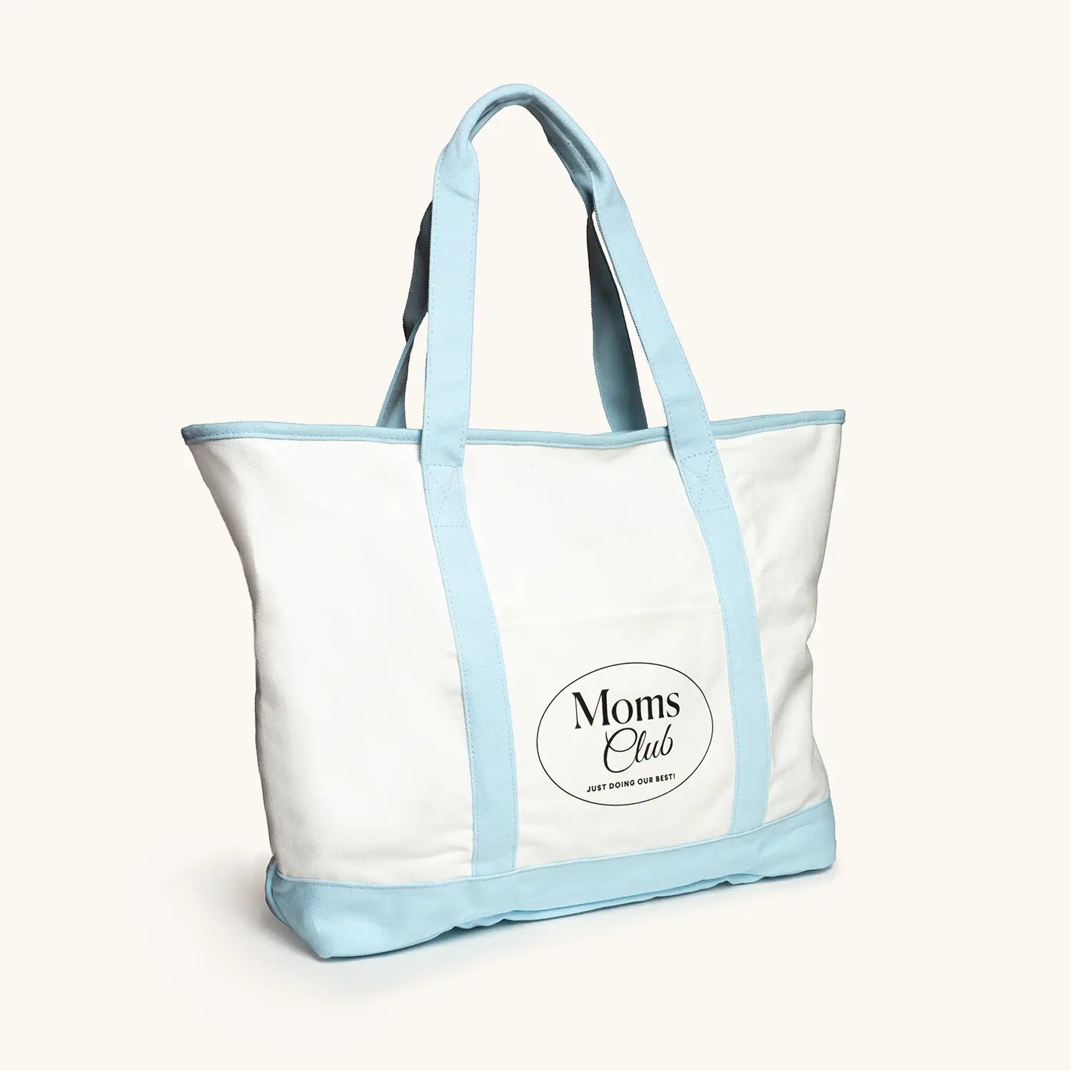 Large tote bag with white body and blue accents against a white background
