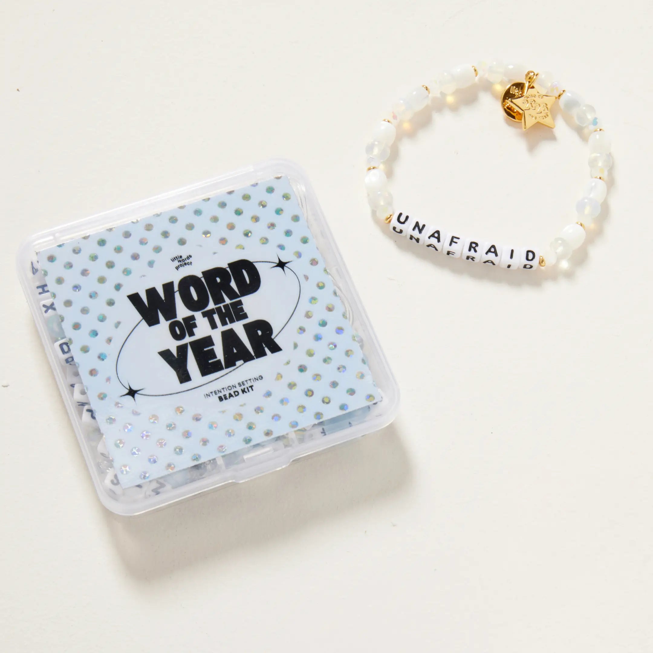 Packaged product with 'Word of the Year' text and a bracelet on a white background