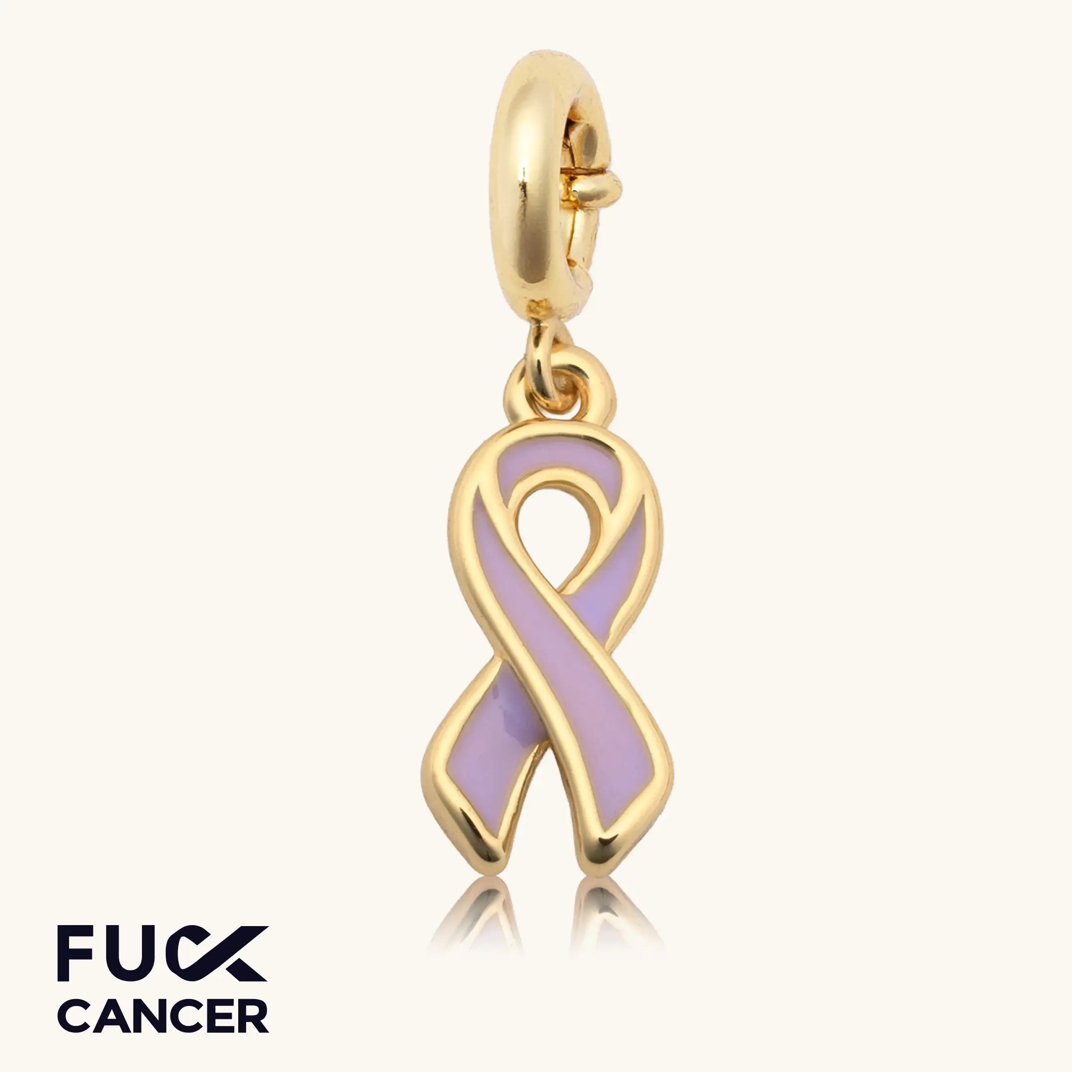 Gold charm with a purple ribbon on a white background, featuring the 'Fuck Cancer' logo.