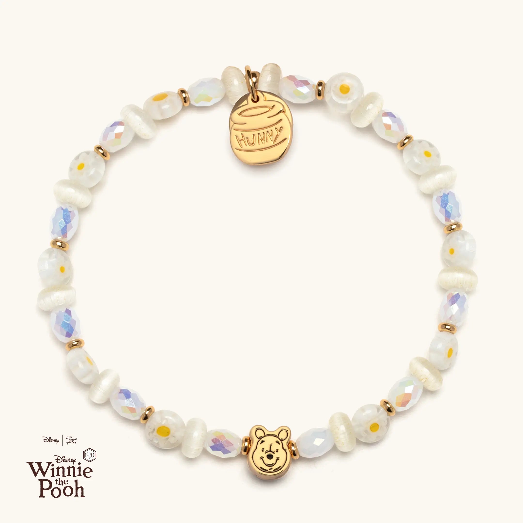 Bracelet with Winnie the Pooh casted bead on a white background