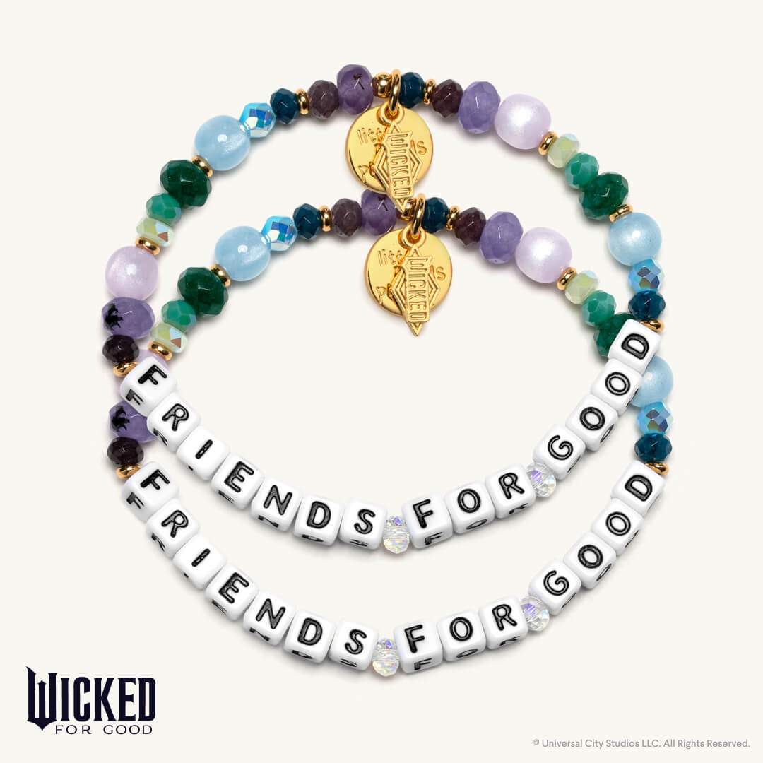 Colorful beaded bracelet with gold charms and 'Friends for Good' text on a white background, featuring the Wicked For Good brand.