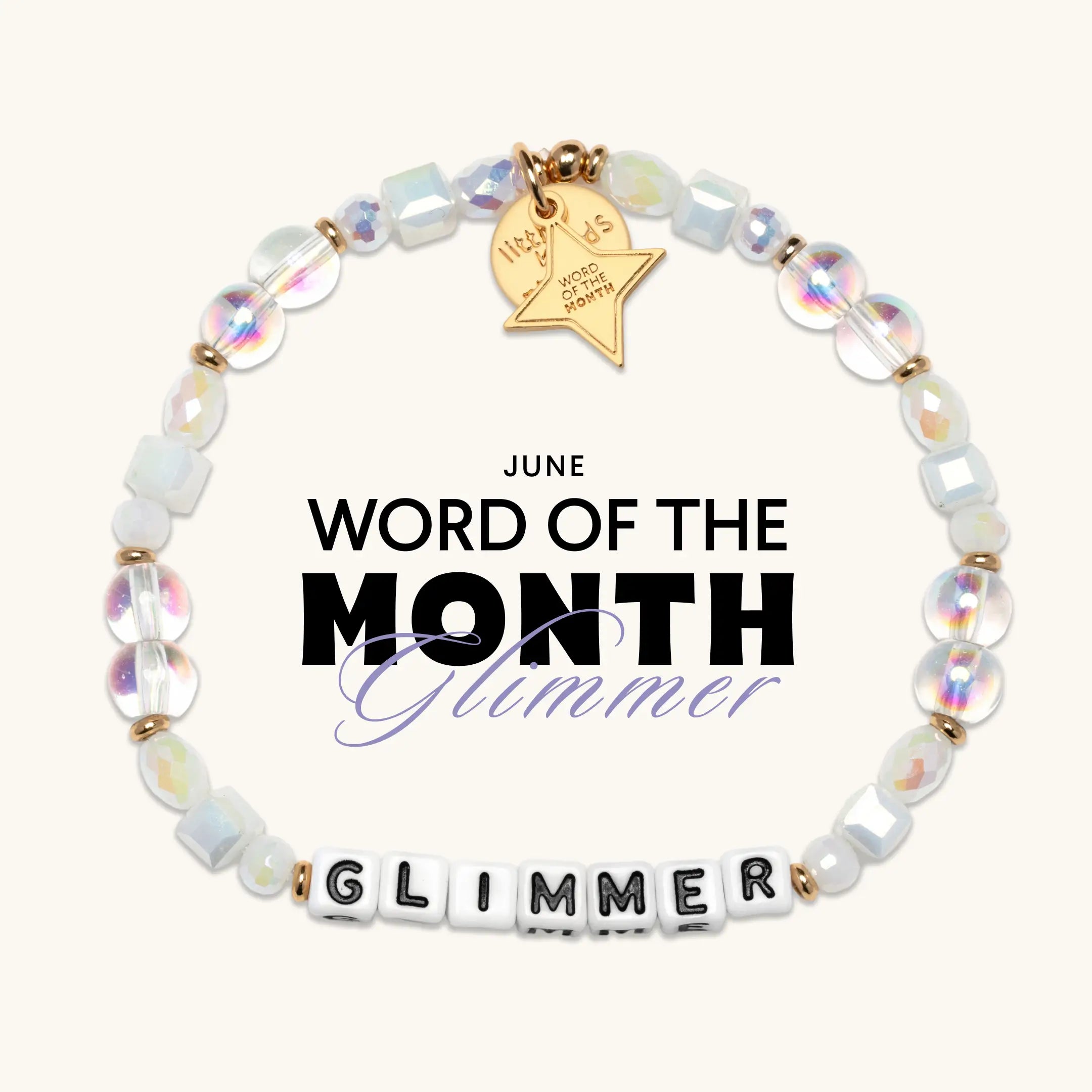 Bracelet with beads and a charm on a white background, featuring 'June Word of the Month Glimmer'.
