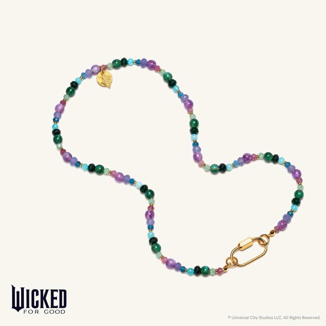 Multicolored beaded necklace with gold clasp on a white background, featuring the brand 'Wicked for Good'.