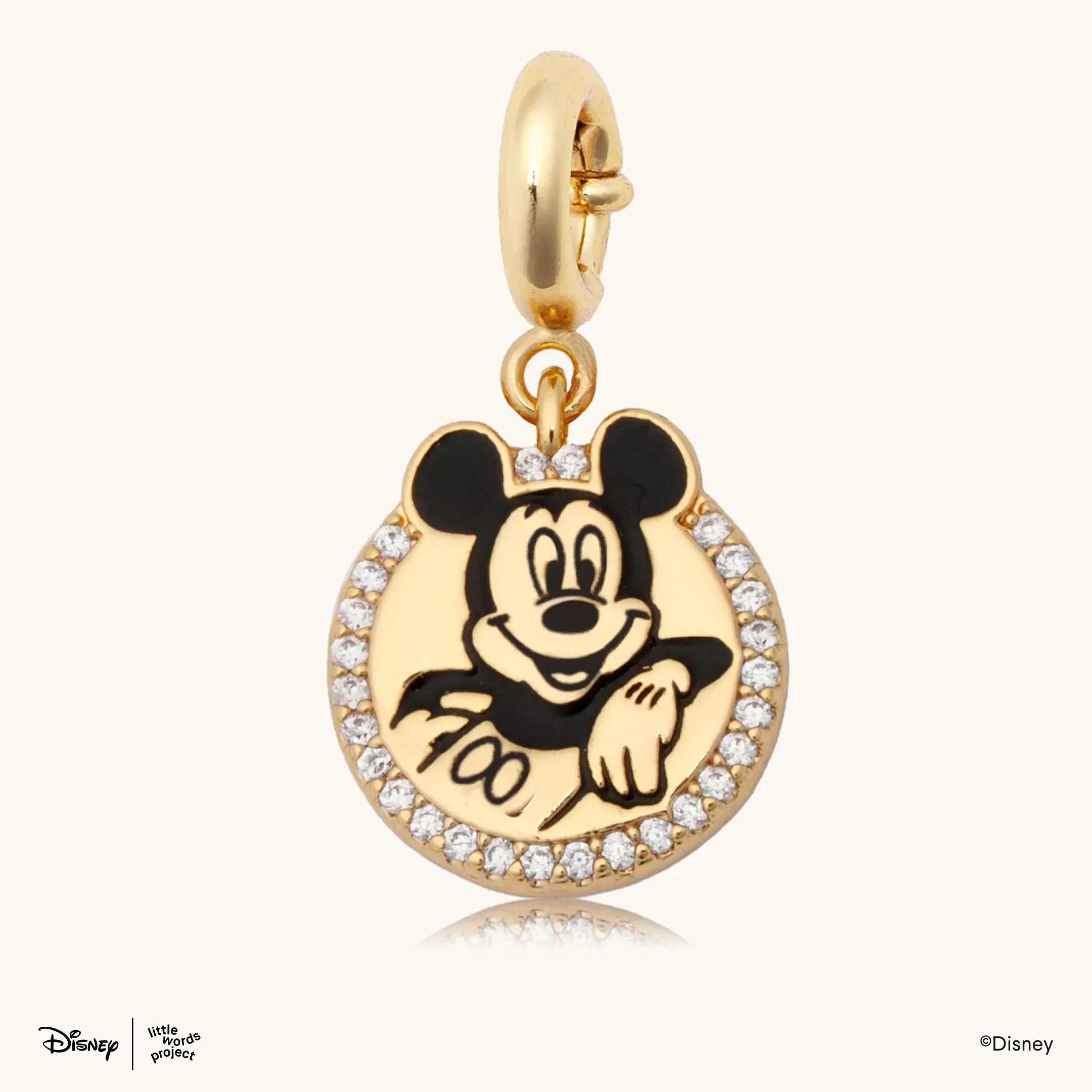 Mickey Mouse Badge Charm from Disney Mickey and Friends, gold plated round charm with a black and gold Mickey Mouse illustration and a pave crystal border
