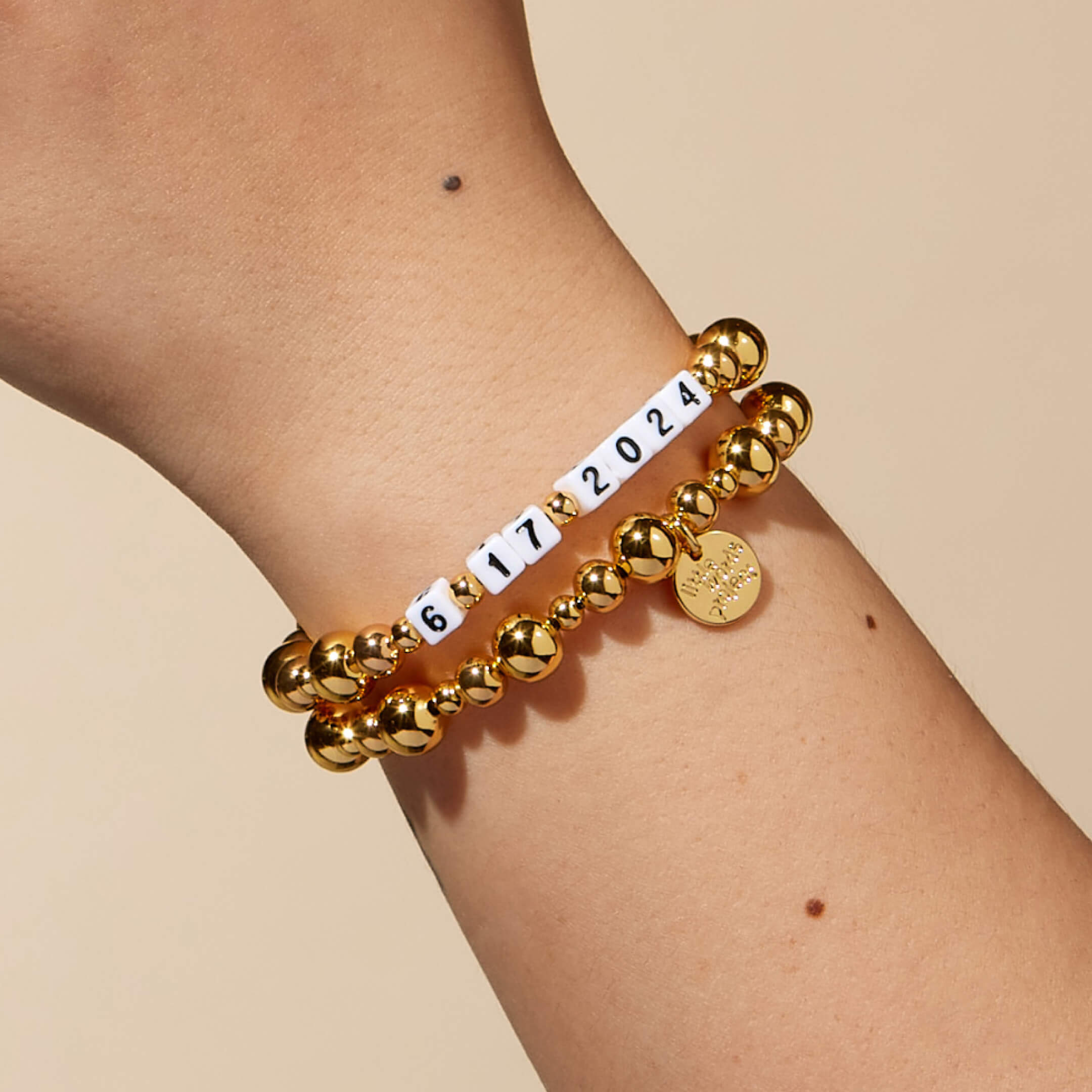 Custom Gold Bubbles on Wrist