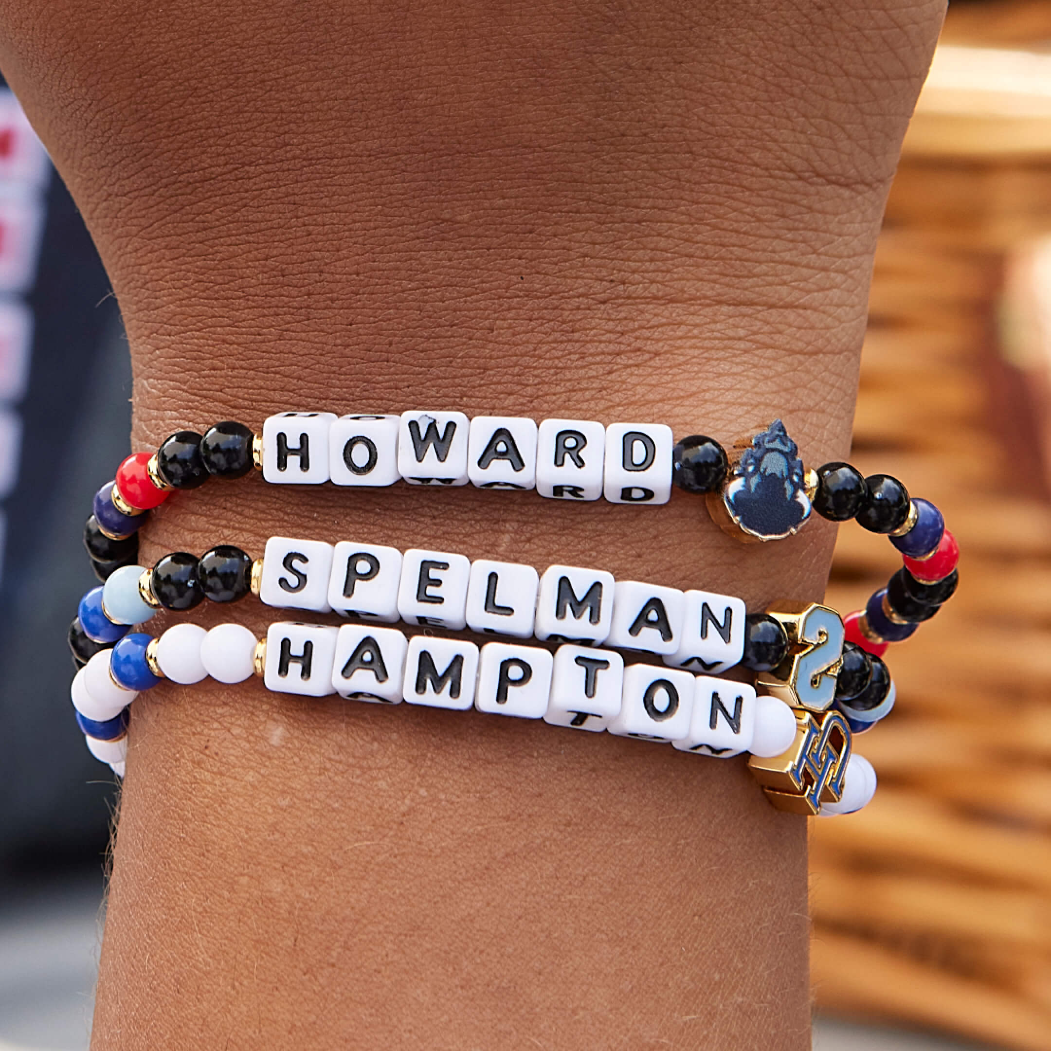 College Bracelets on a Wrist