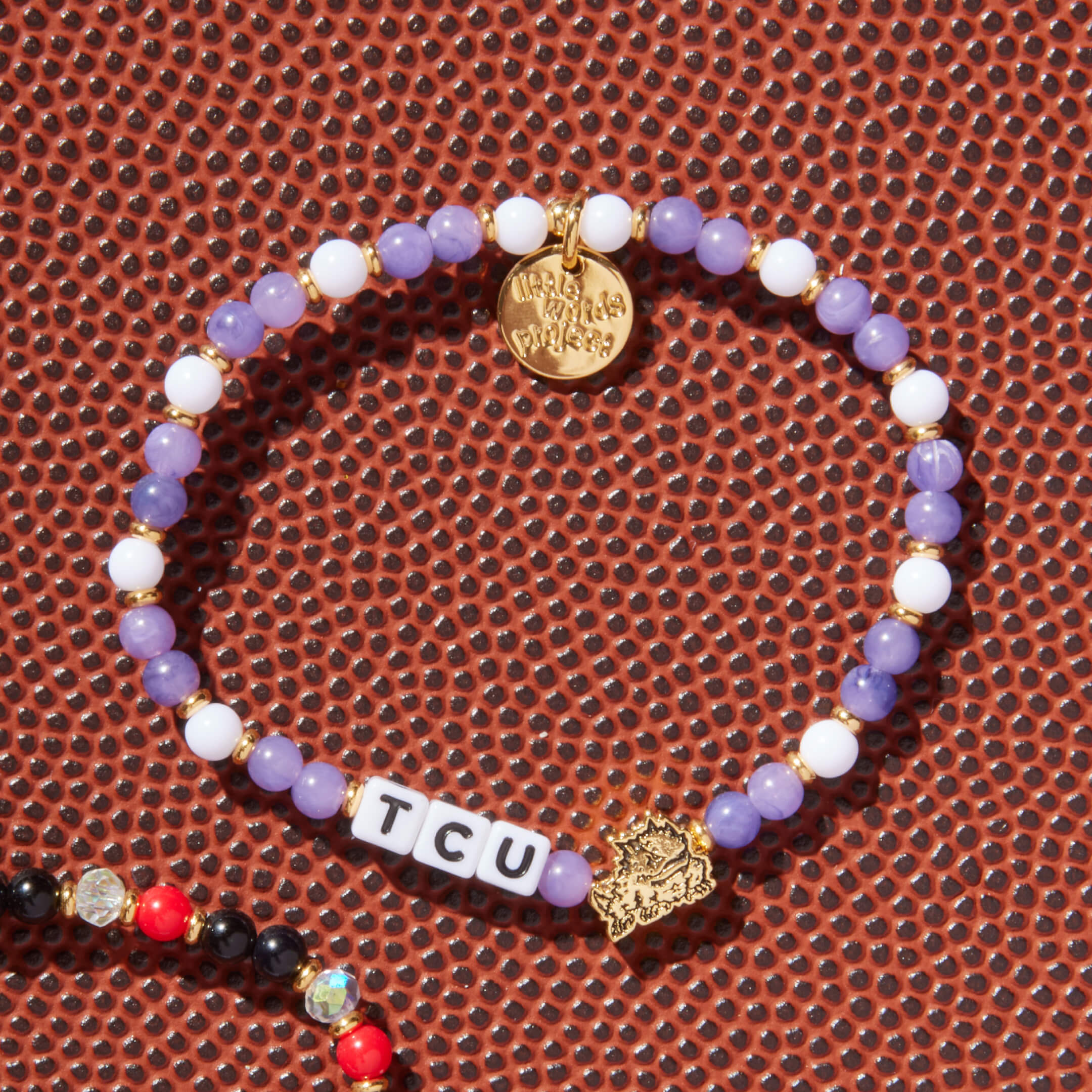 TCU Bracelet on a football