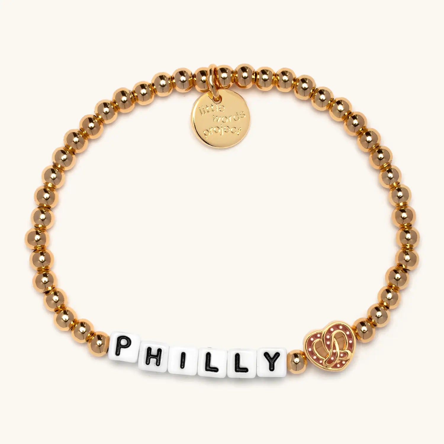 Gold beaded bracelet with 'PHILLY' on a white background
