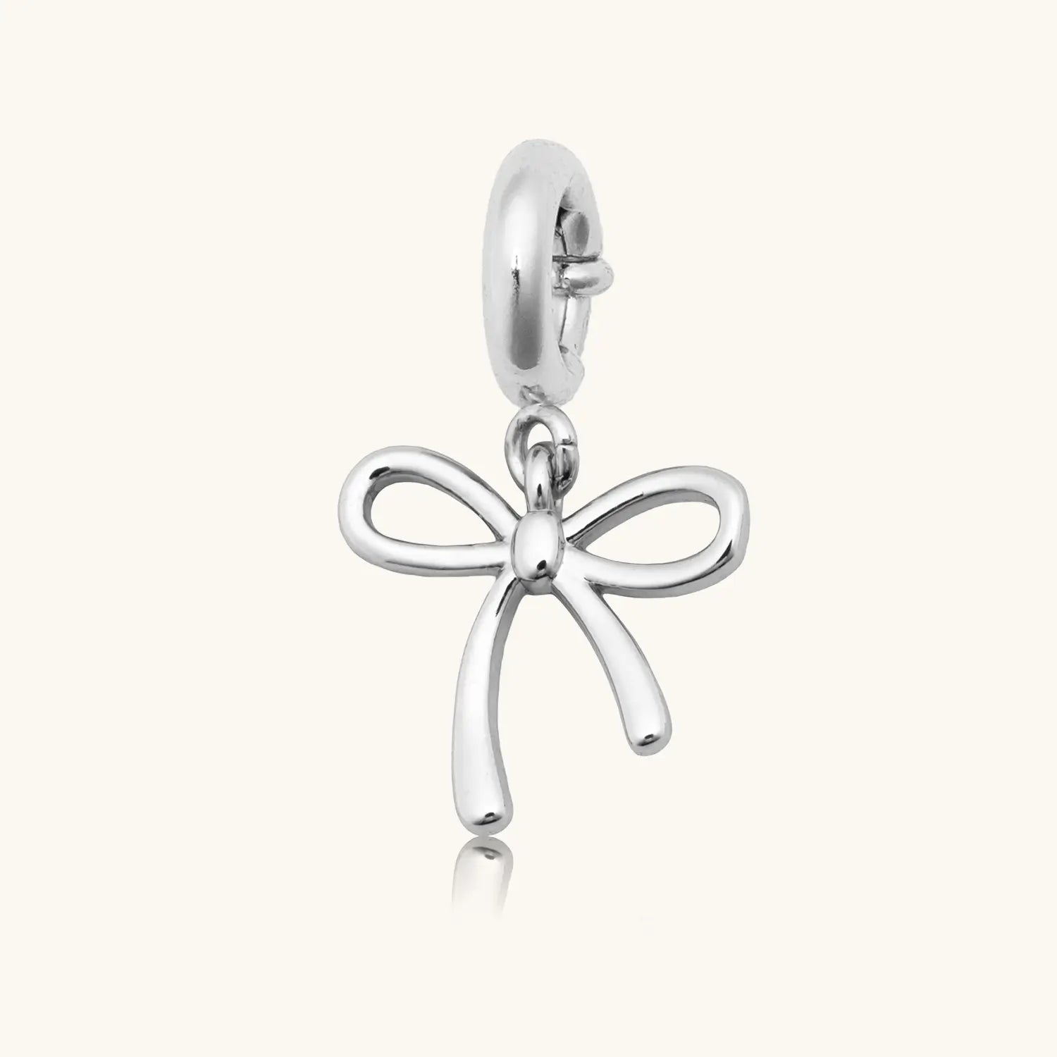 Silver open-loop bow charm pendant with a spring-ring clasp, shown on a white background.