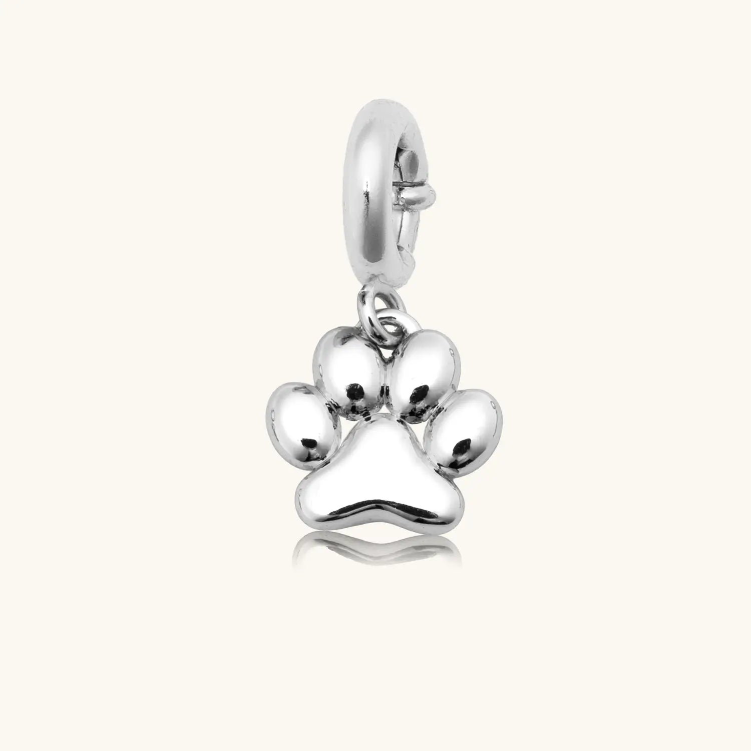 Silver paw print charm pendant with a spring-ring clasp, shown on a white background.