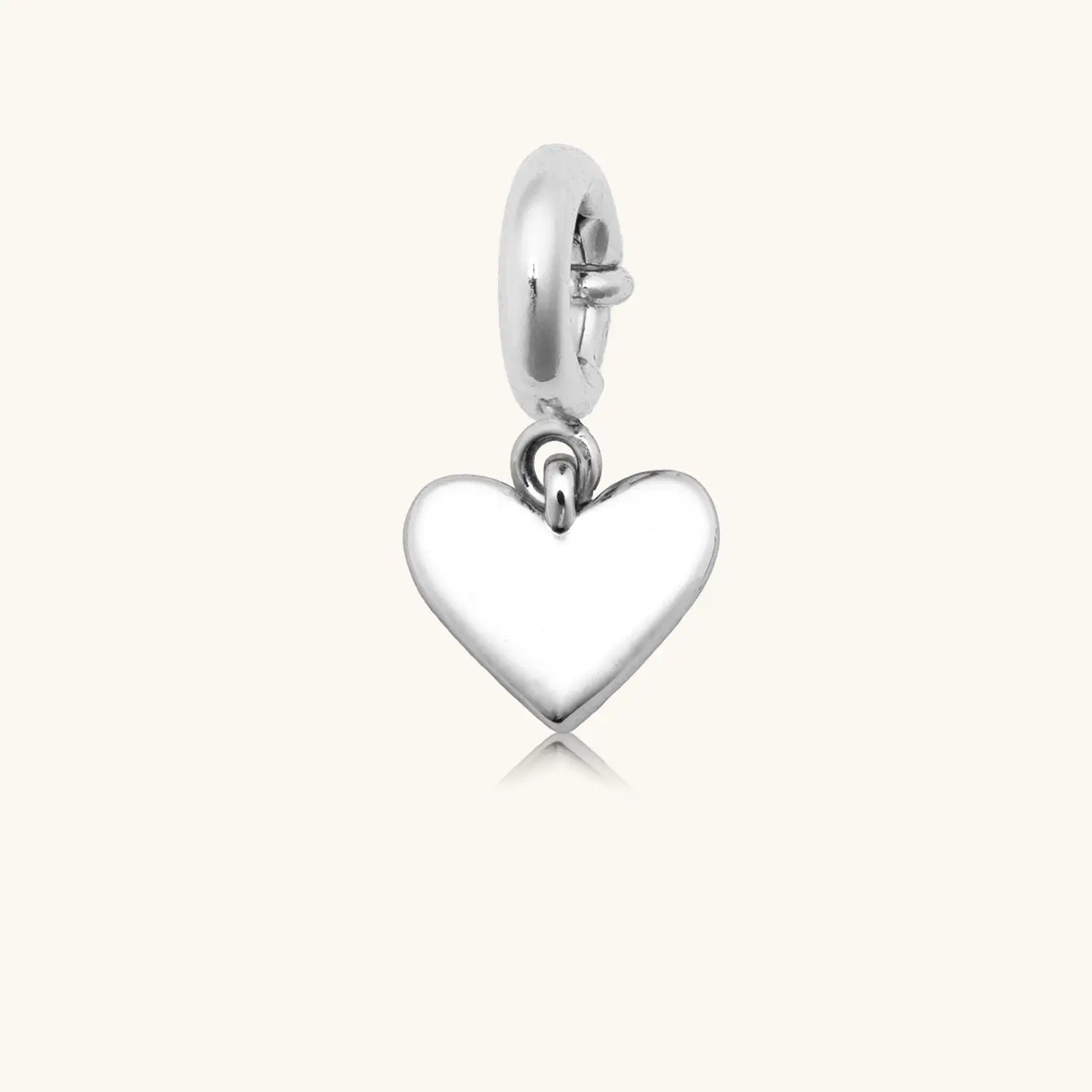 Silver polished heart charm pendant with a spring-ring clasp, shown on a white background.