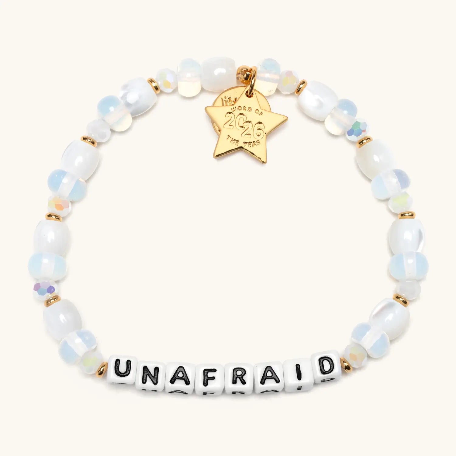 Bracelet with 'UNAFRAID' and star-shaped tag on a white background