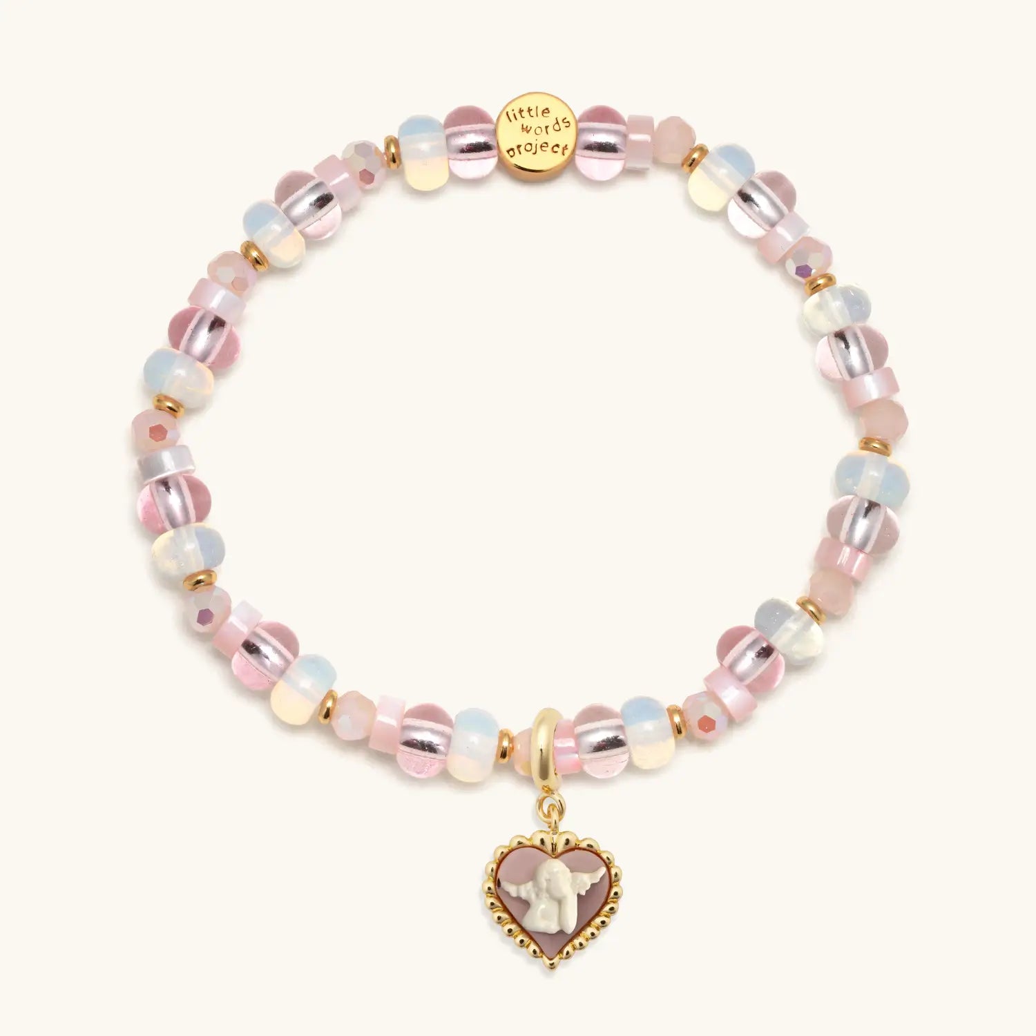 Pink beaded bracelet with heart-shaped charm on a white background
