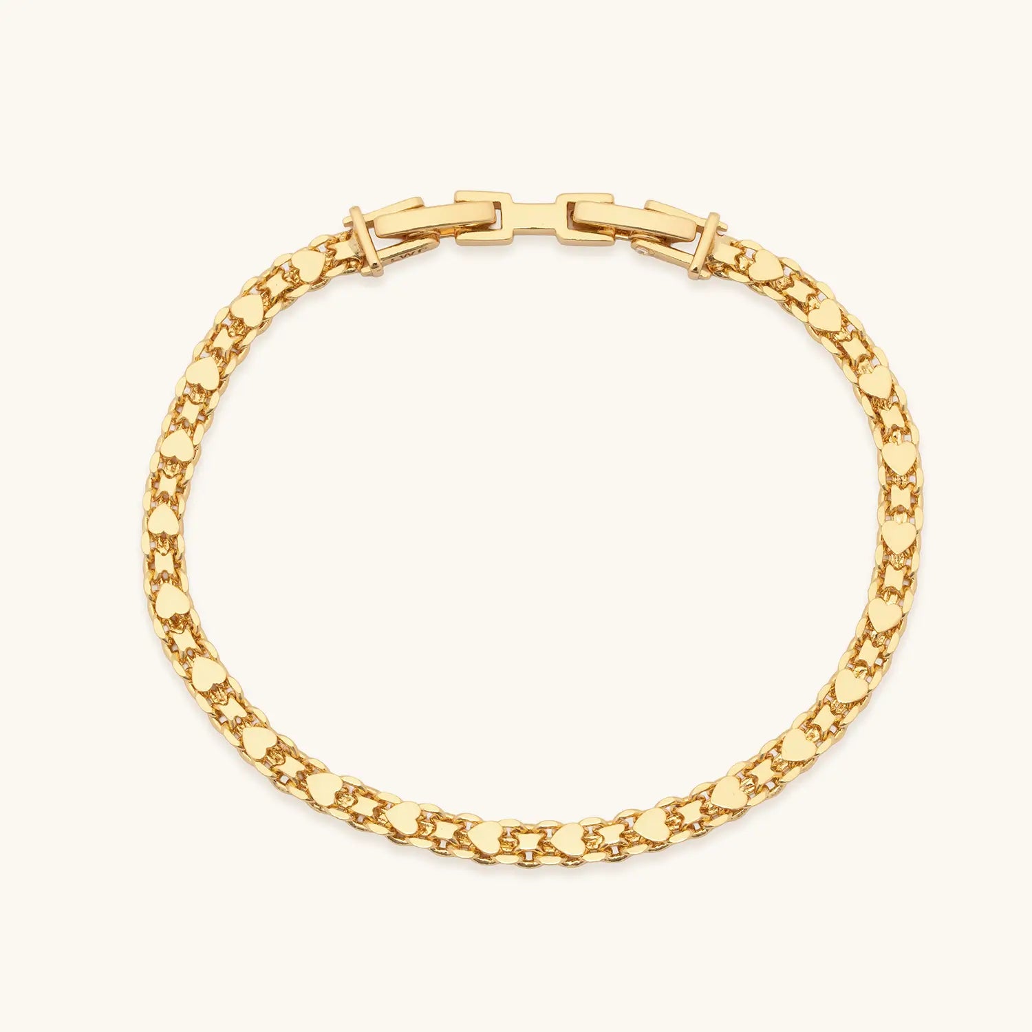 Gold bracelet on a white background