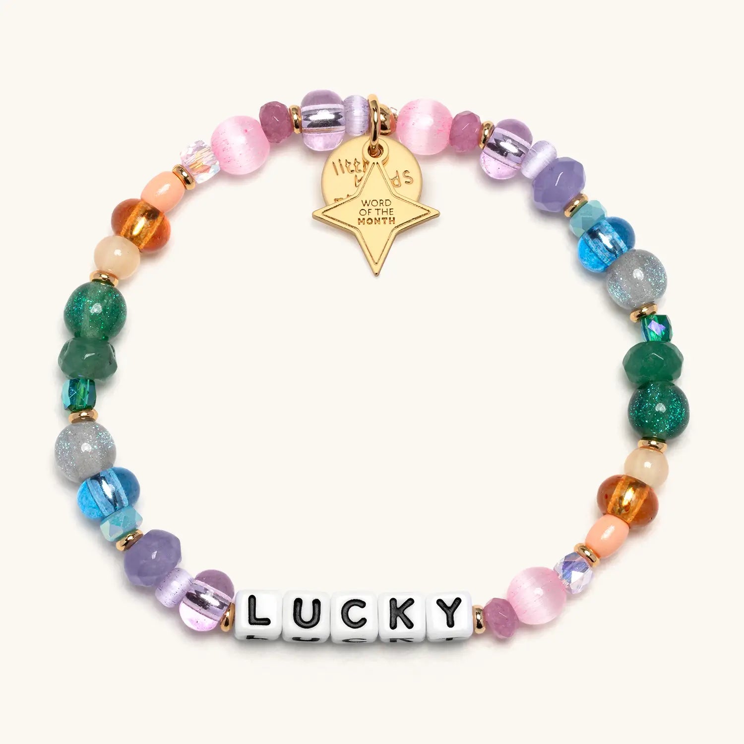 Lucky March Word of the Month bracelet with multicolored beads, white letter beads, and a gold tag on a white background