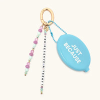 You Deserve A Treat Bag Charm with purple and mint beaded tassel on gold ring clip
