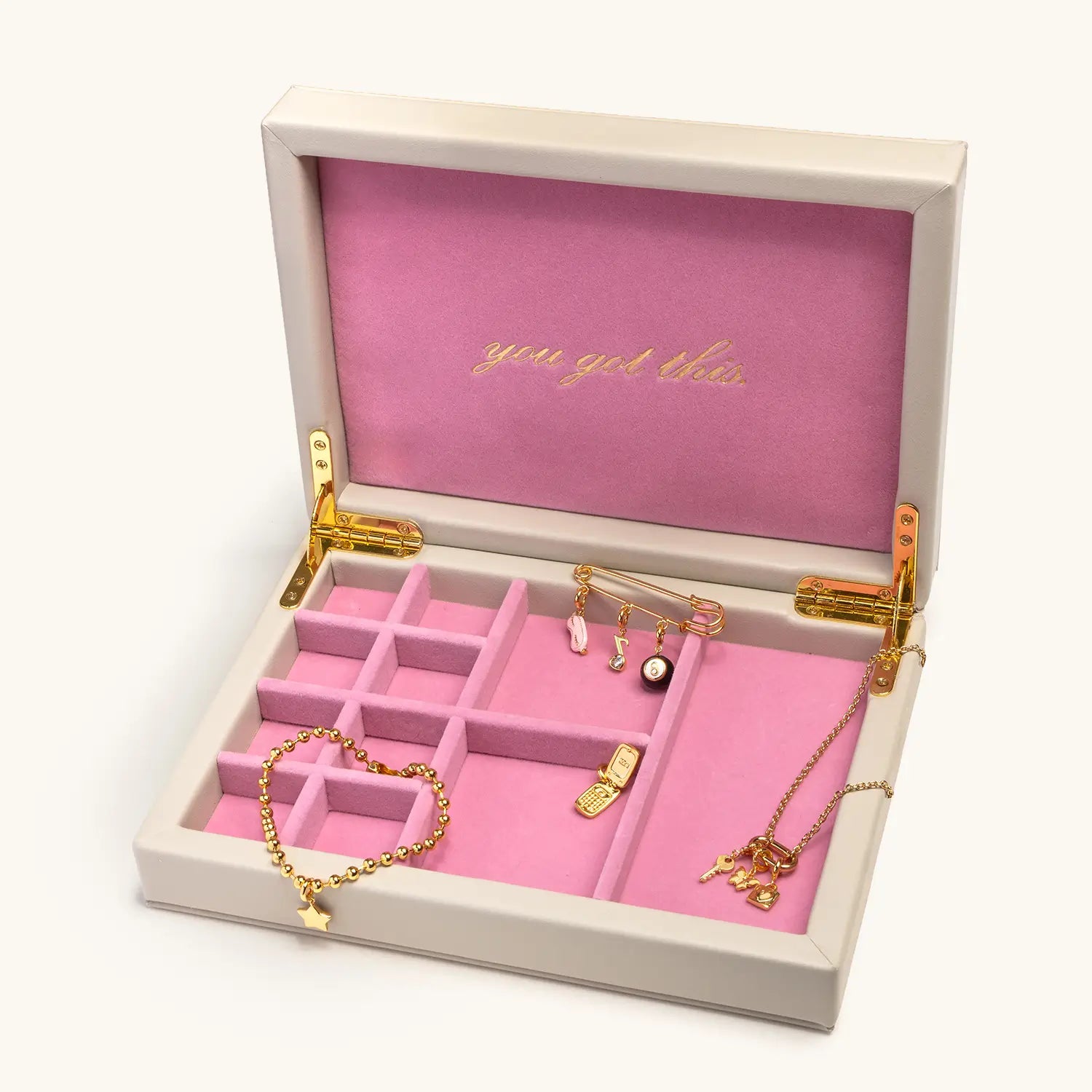Jewelry set in a pink and gold jewelry box with 'you got this' text.