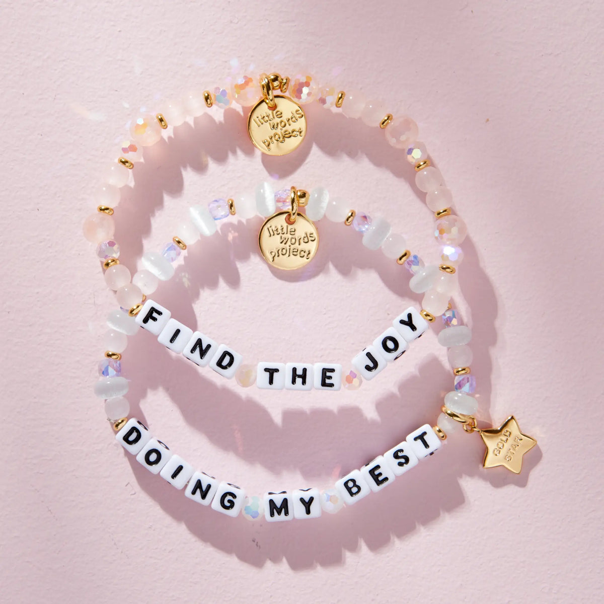 Daydreamer Bracelet Set stacked, flat lay on pink
