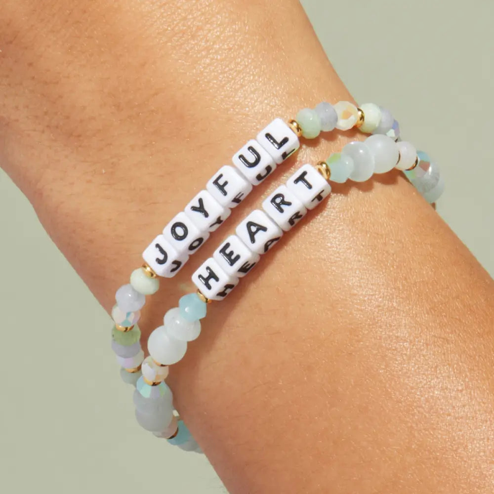 Joyful Heart bracelets on wrist