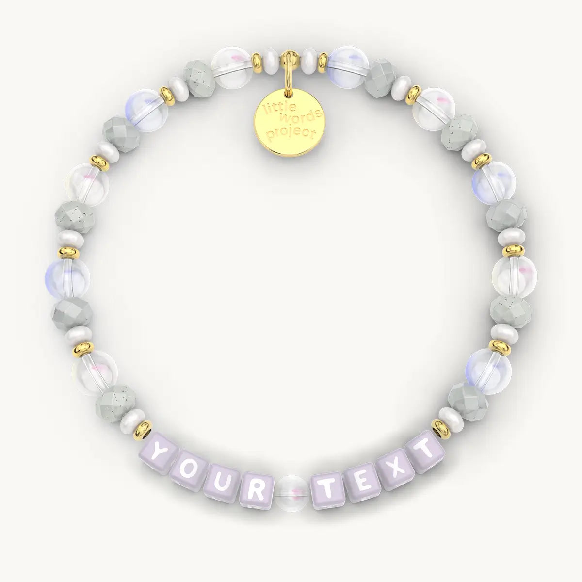 Personalized beaded bracelet with 'YOUR TEXT' on a white background