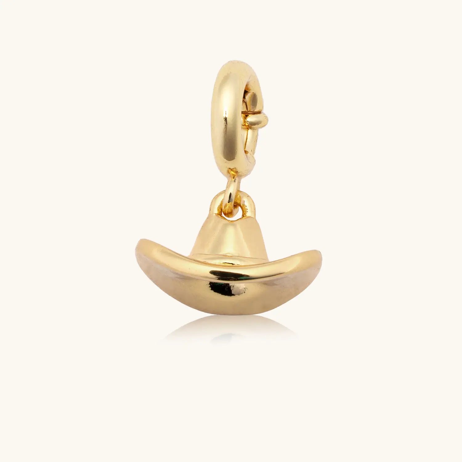 Gold cowboy hat charm pendant with a spring-ring clasp, shown on a white background.