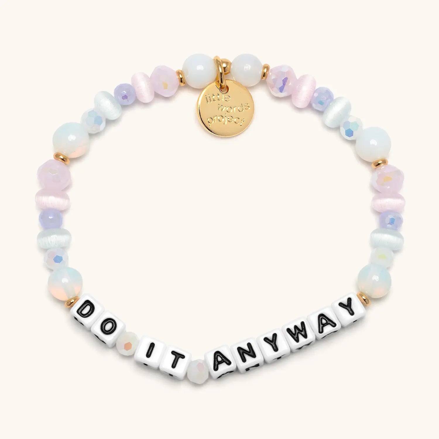 Do It Anyway — front flat-lay of beaded word bracelet in white and pastel beads
