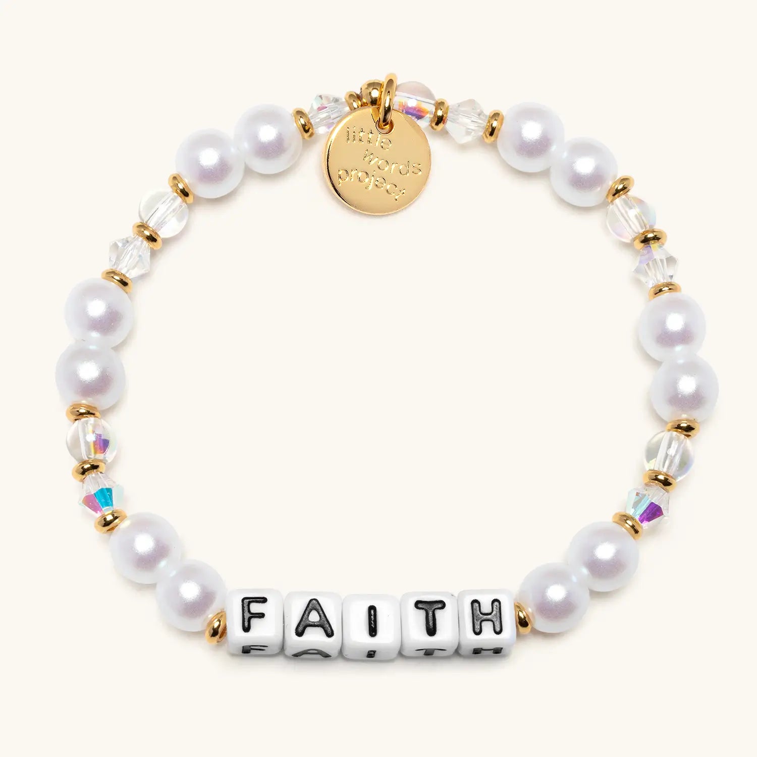 Pearl bracelet with gold accents and 'FAITH' beads on a white background