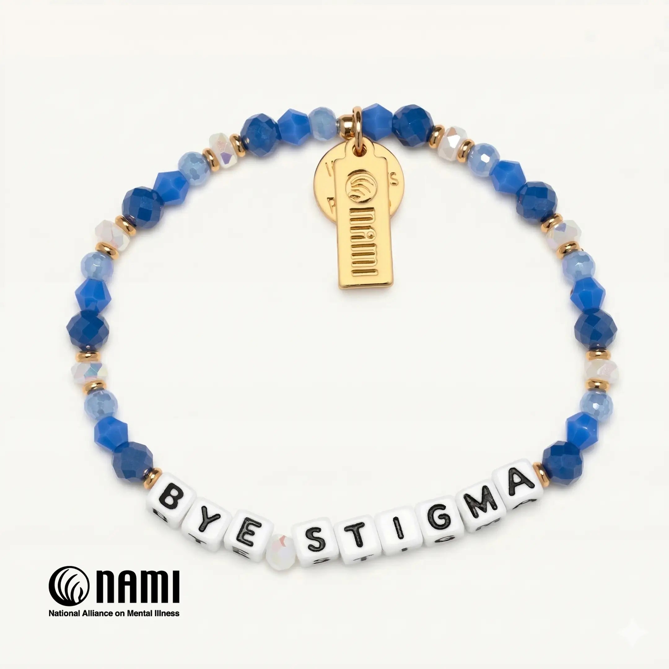 Bracelet with blue beads and 'BYE STIGMA' tiles, featuring a gold tag, on a white background with NAMI logo.