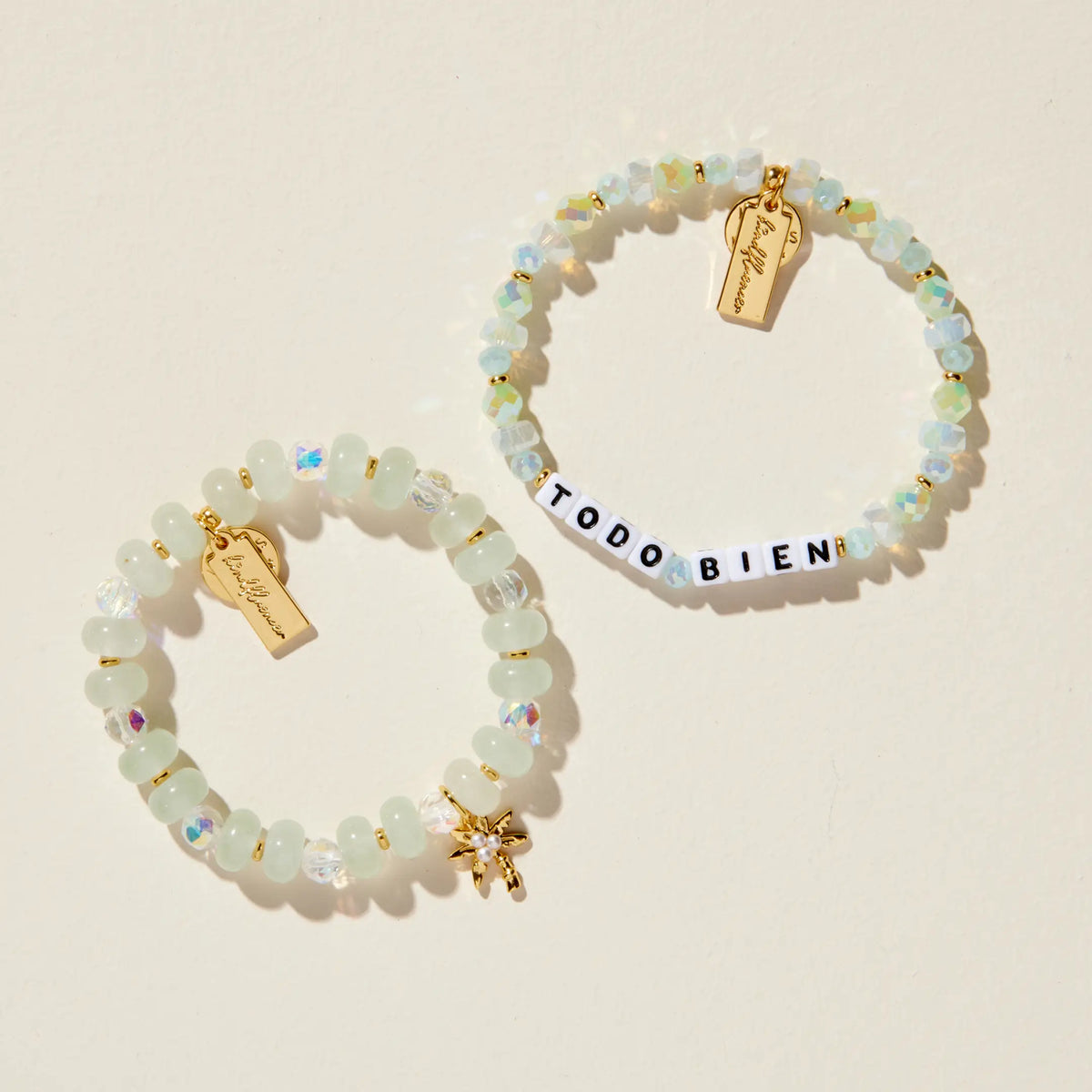 Todo Bien Bracelet Set Alexia Del Valle worn stacked on wrist, Todo Bien bracelet and Palm Tree Charm Bracelet