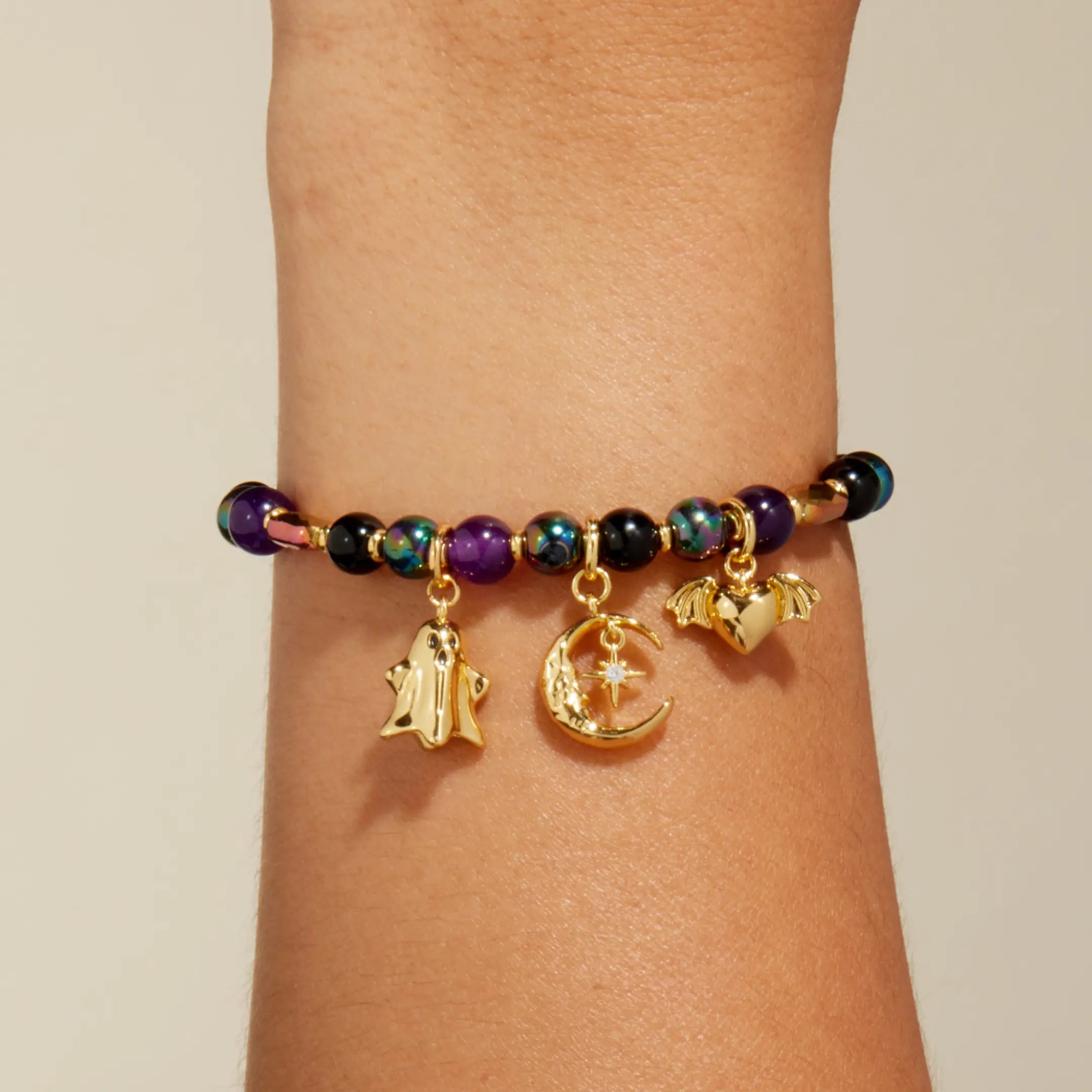 Halloween charms on wrist