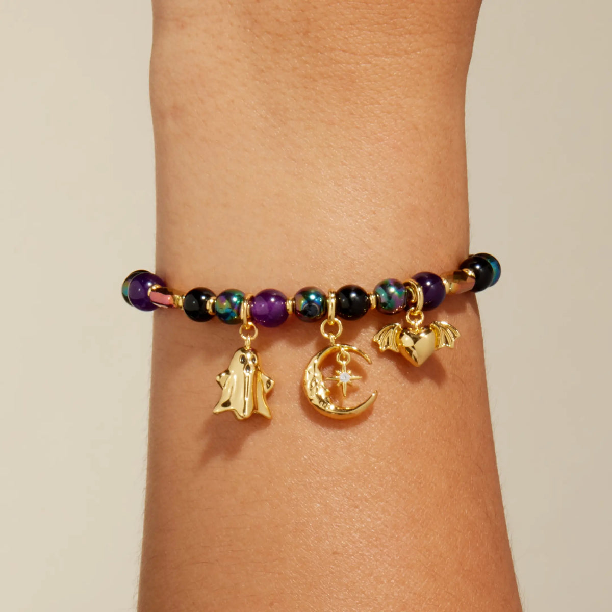 Halloween charms on wrist